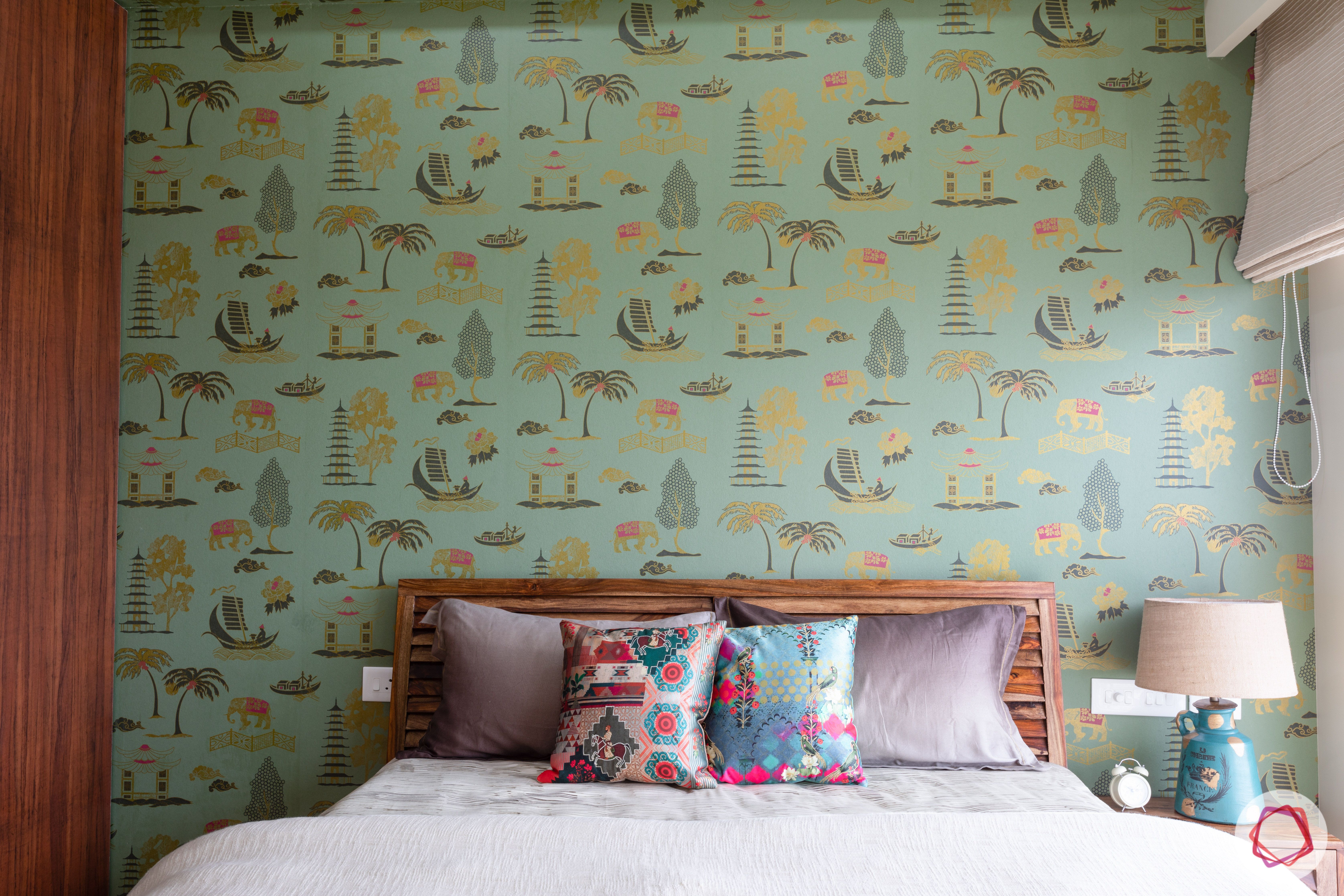 crescent bay-guest bedroom-green wallpaper-wooden bed