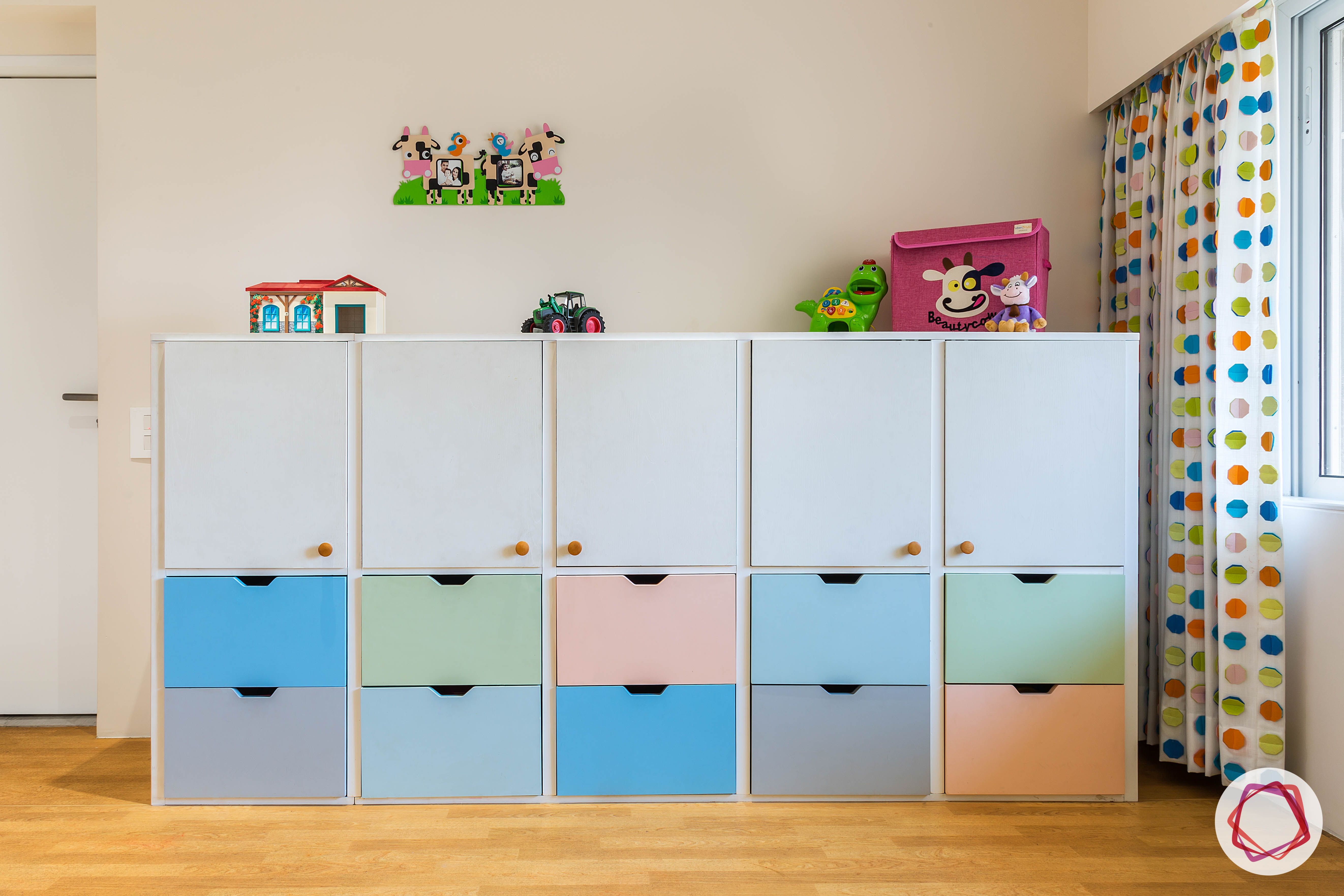 kids-room-toy-storage-cabinet-blue-pink-green-drawers
