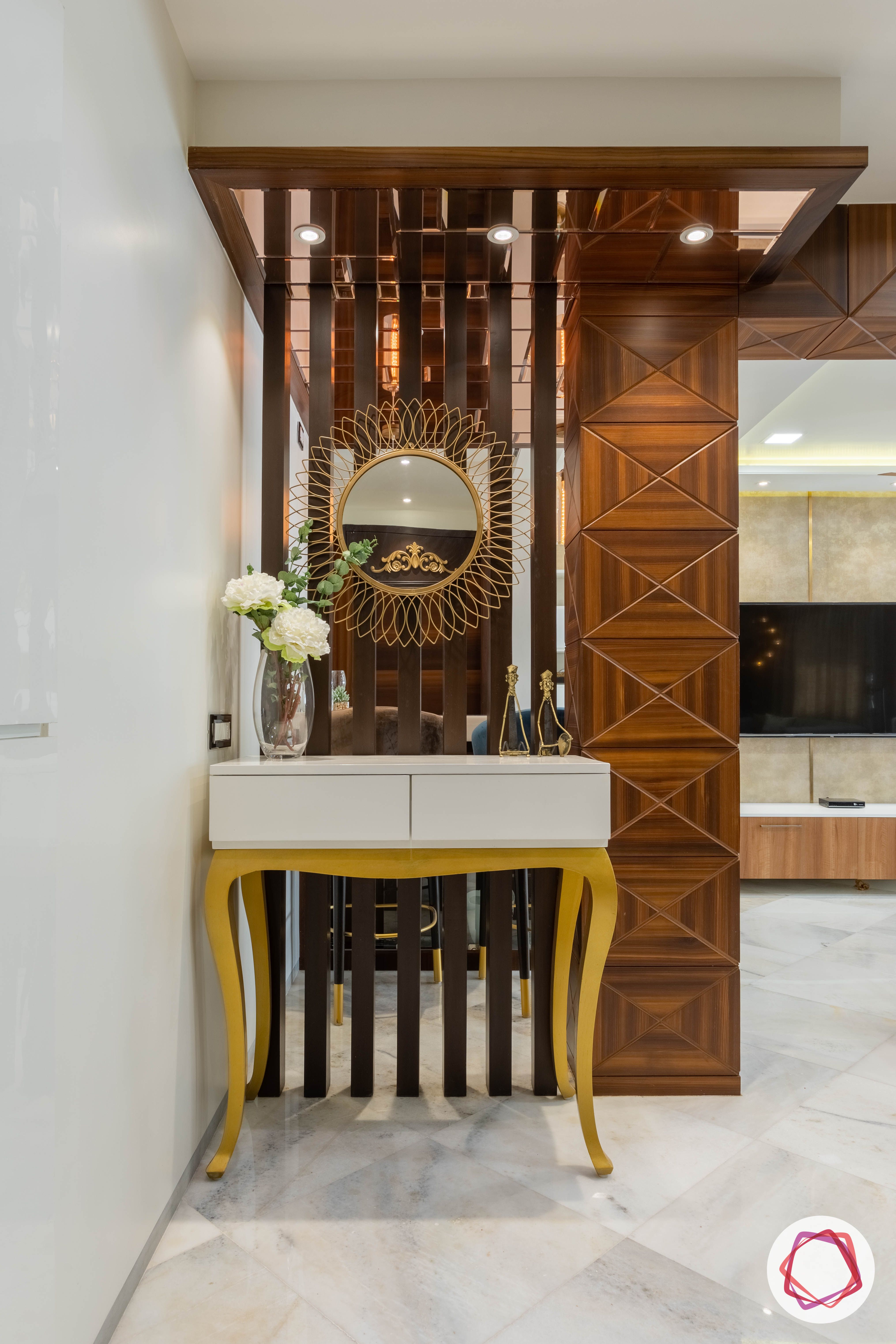 residential-interior-designers-in-mumbai-foyer-wood-gold-console-table

