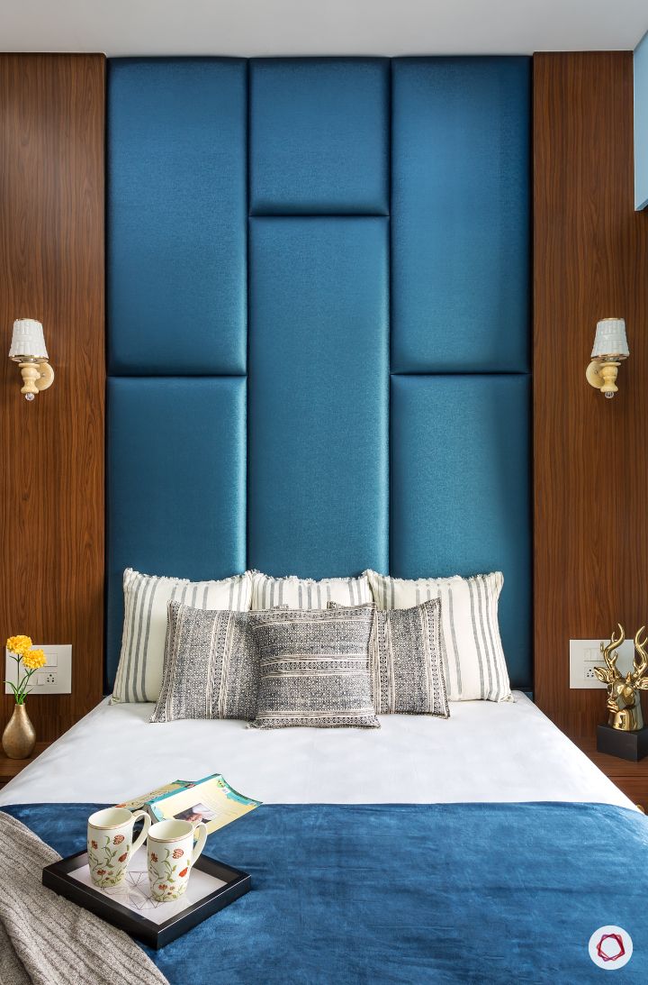 best interior designers in mumbai-parents room-full bed-upholstered headboard-blue headboard
