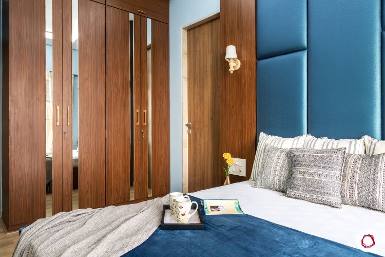 best interior designers in mumbai-parents room-laminate wardrobe-mirror panel-swing door wardrobe