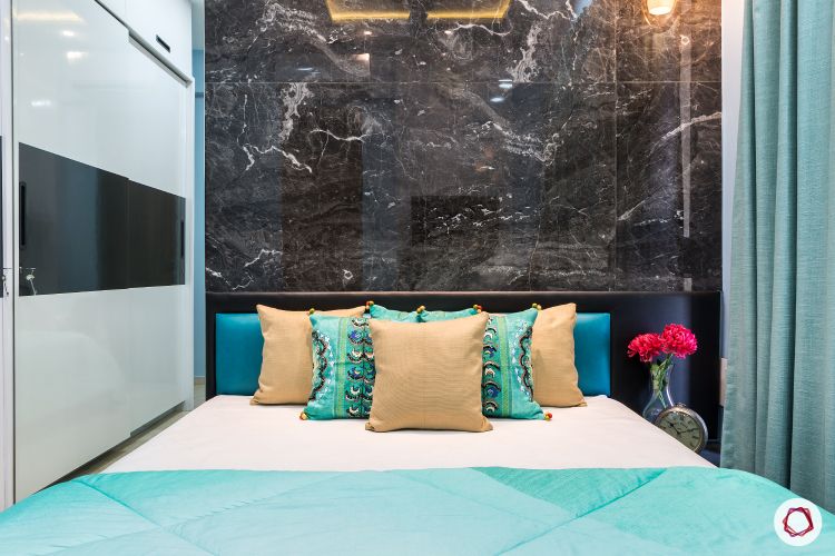 best interior designers in mumbai-bedroom-marble tiles-black tiles-sliding wardrobe-bed