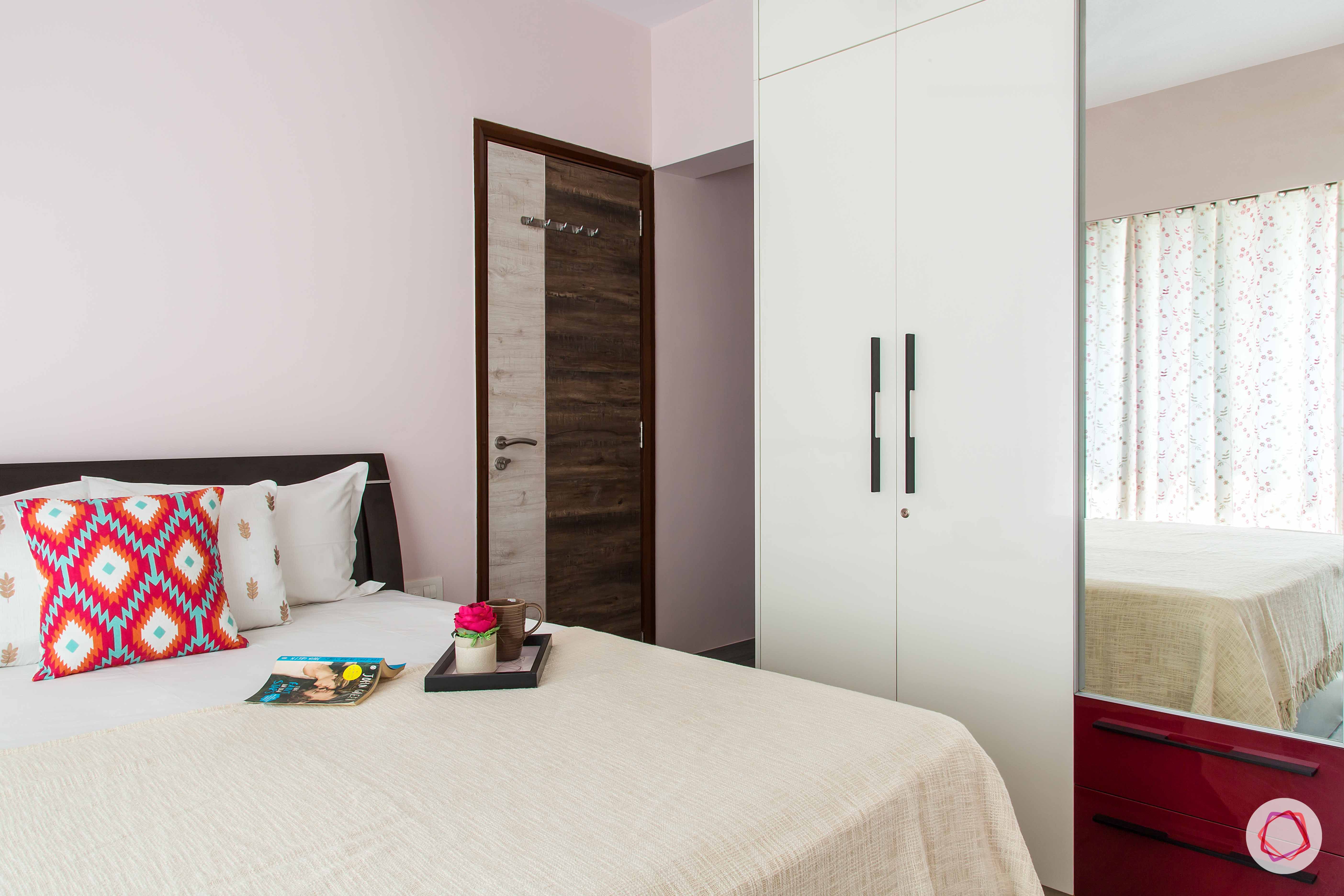 pink-white-bed-red-pillow-curtain-white-wardrobe
