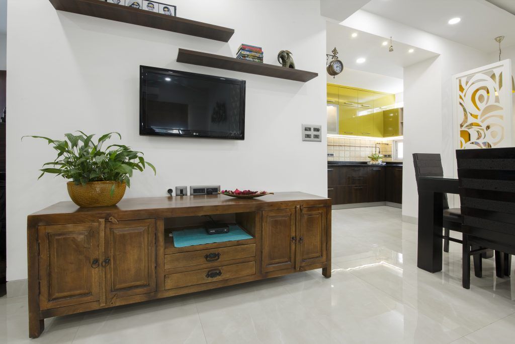 wooden-cabinets-drawers-shelves-plant-pot-table-chairs