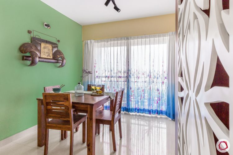 home bangalore-dining table-green wall-printed curtains