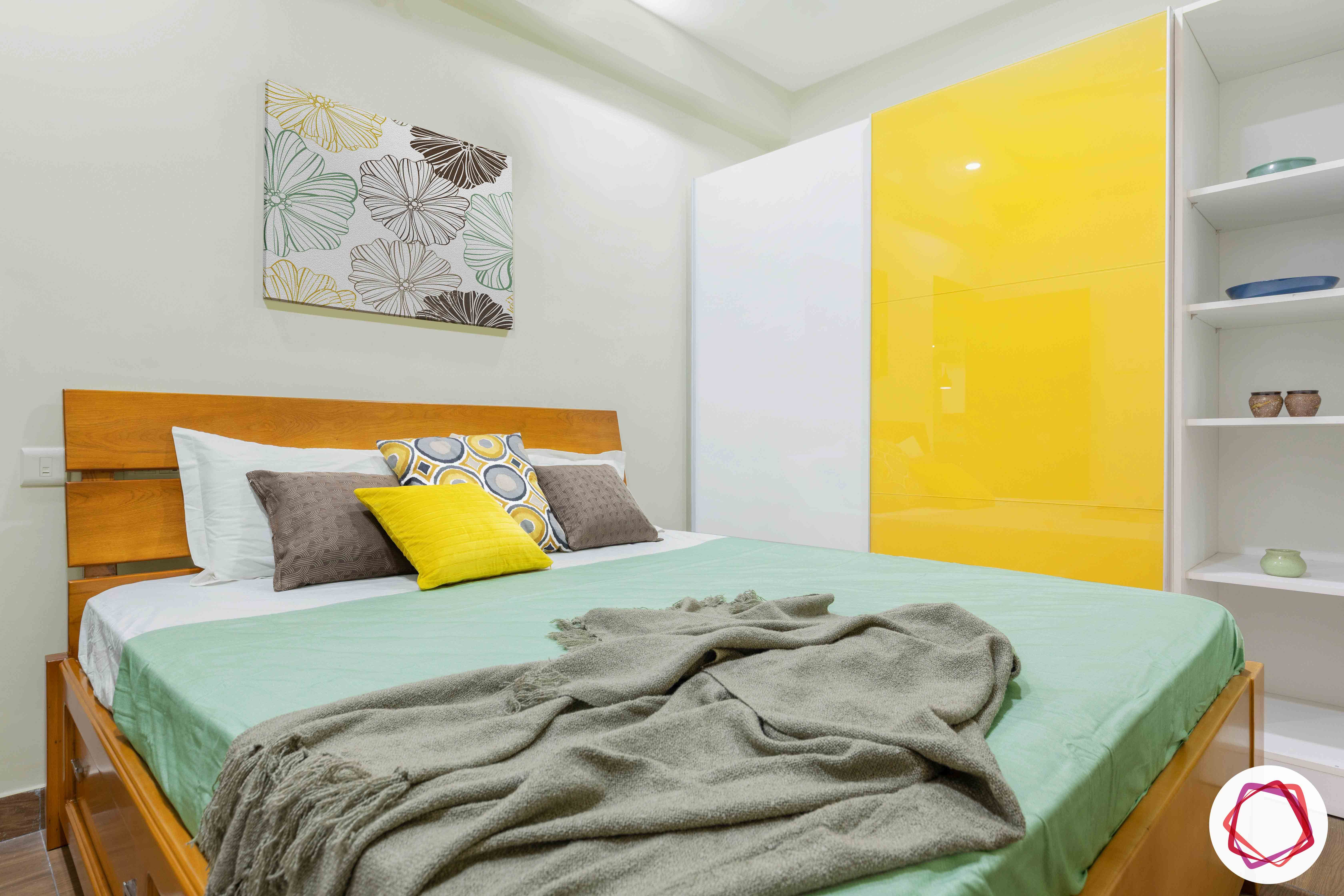 yellow and white wardrobe-yellow blinds-wooden bed
