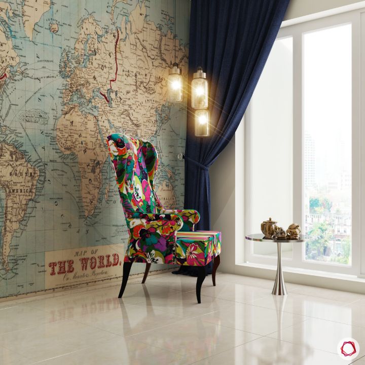 celebrity-homes-travel-inspired-room-accent-chair-world-map-wall-light-window