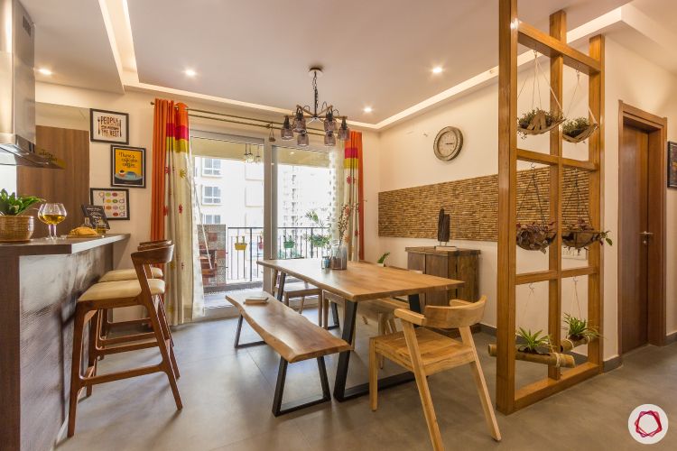 celebrity-homes-john-abraham-inspired-dining-wooden-table-bench-chairs-open-kitchen