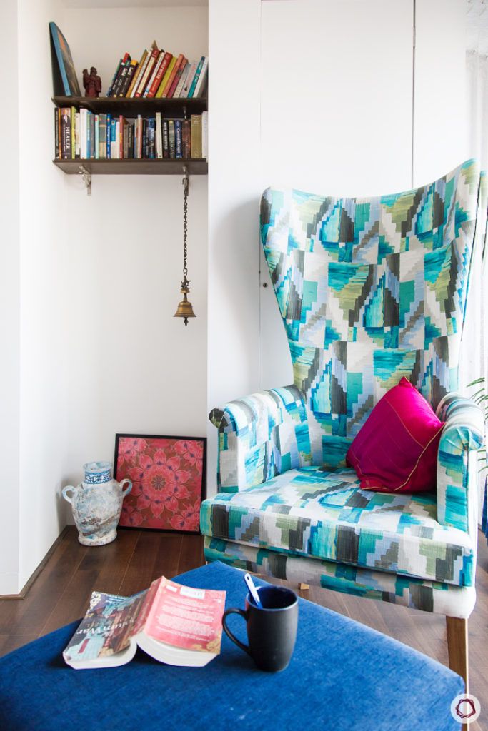 celebrity-homes-balcony-armchair-painting-guitar-books