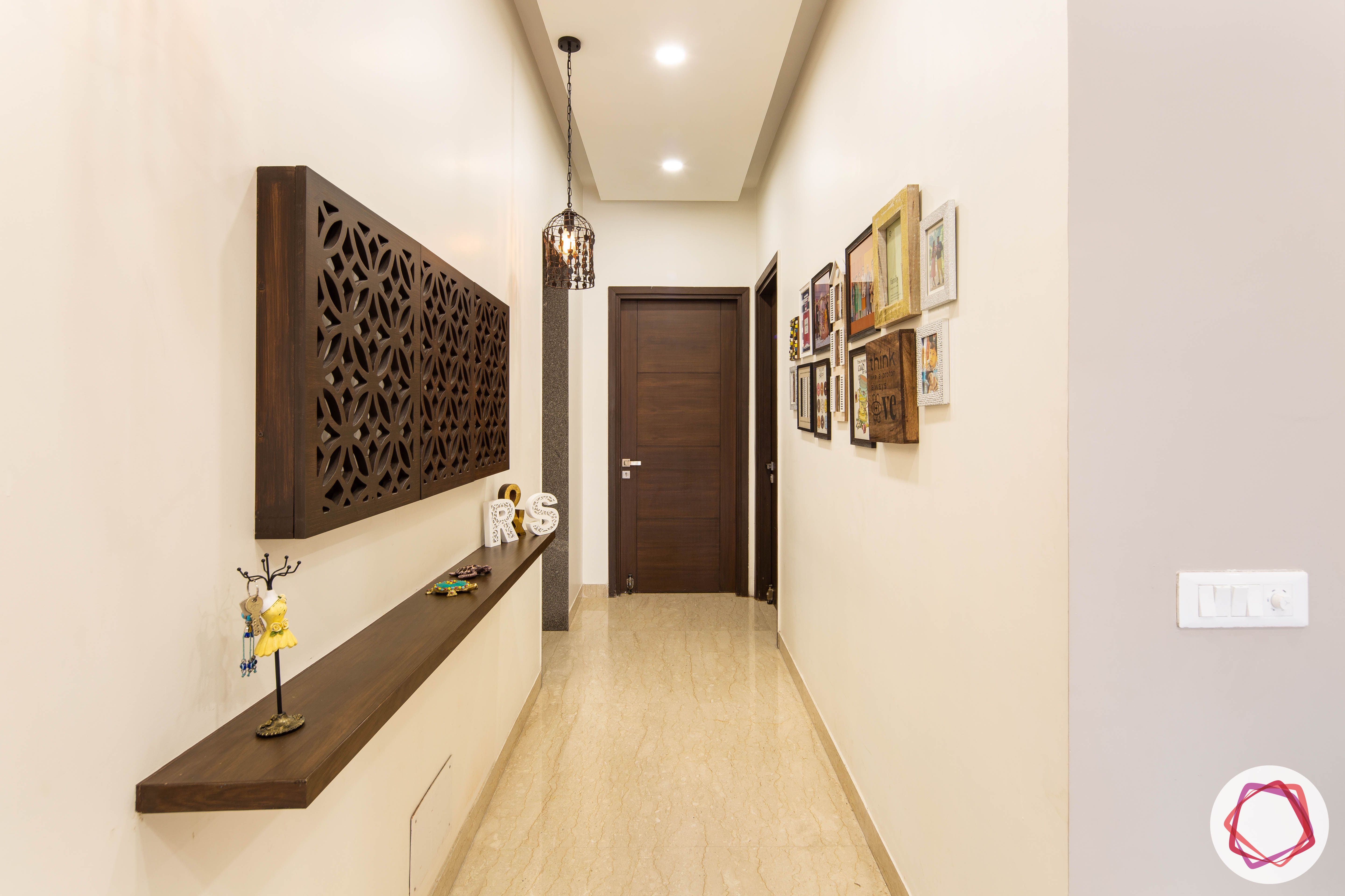 DLF garden villas-foyer-wood-light-shelf-false-ceiling