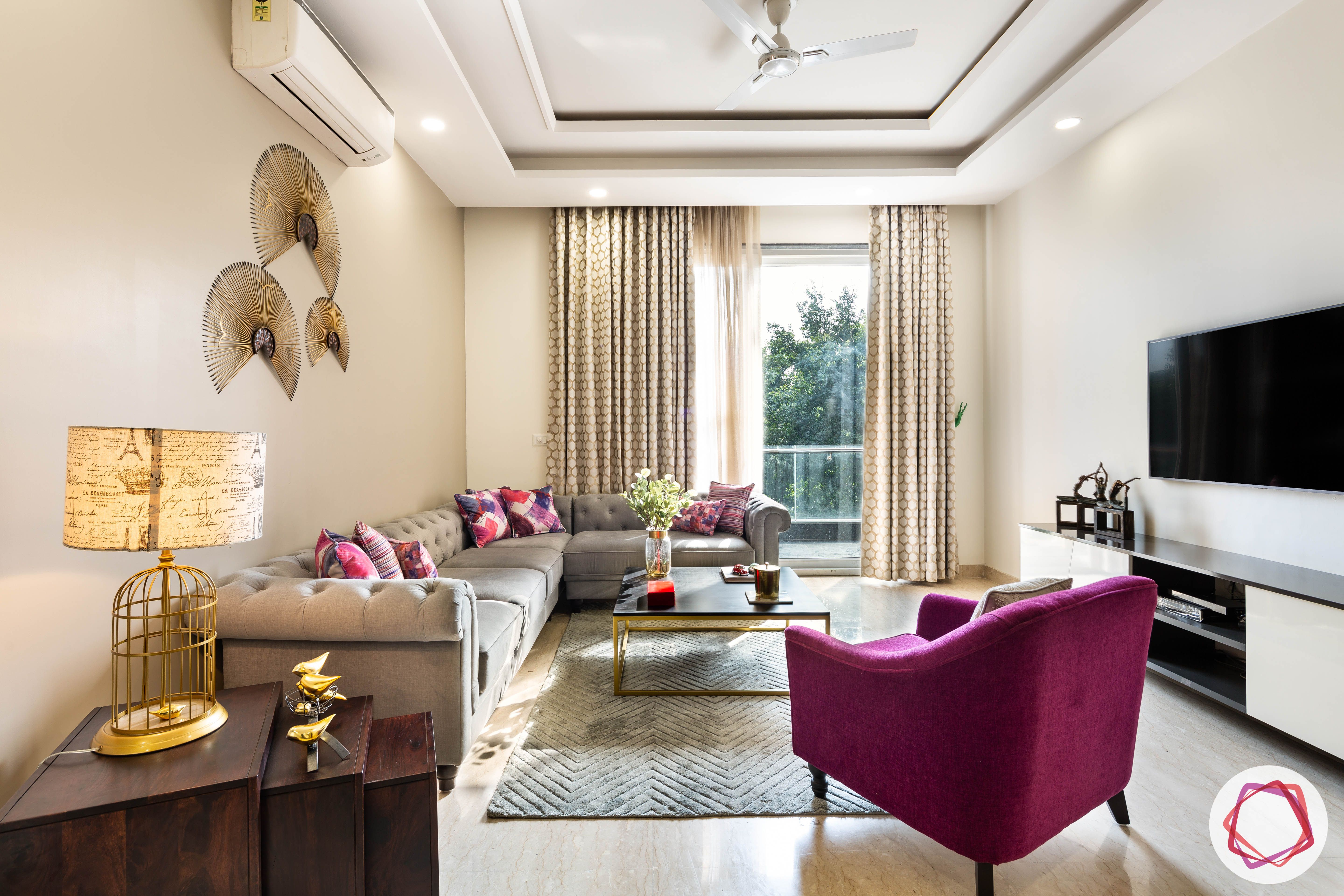 DLF garden villas-living-room-false-ceiling-sofa-table-TV-balcony