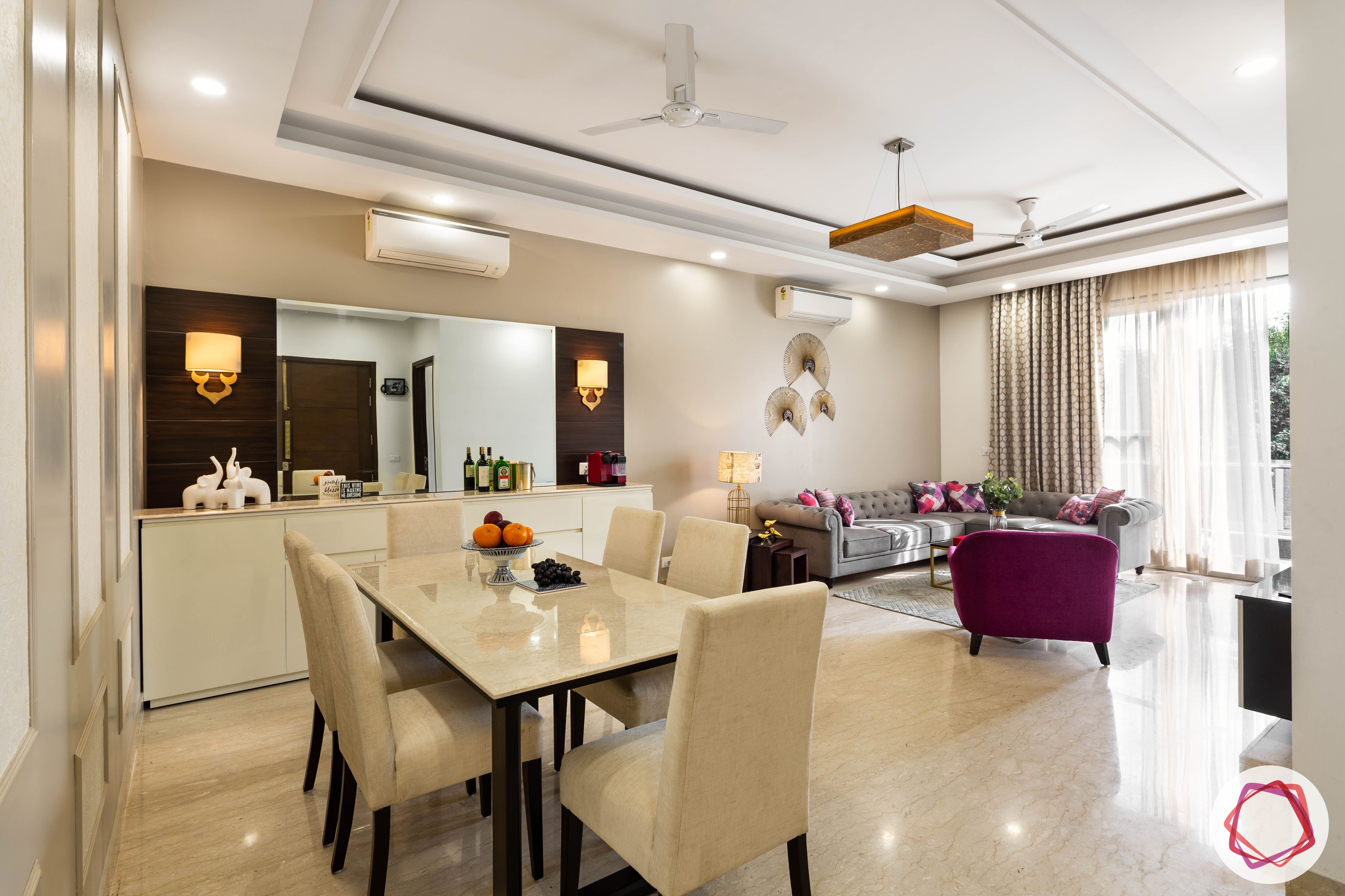 DLF garden villas-dining-room-marble-table-suede-chairs