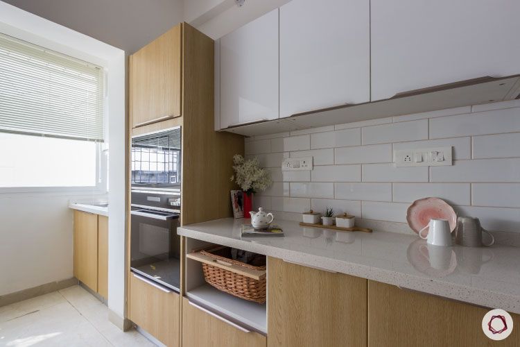 membrane-vs-laminate-white-upper-yellow-lower-cabinets-brown-tiles-kitchen