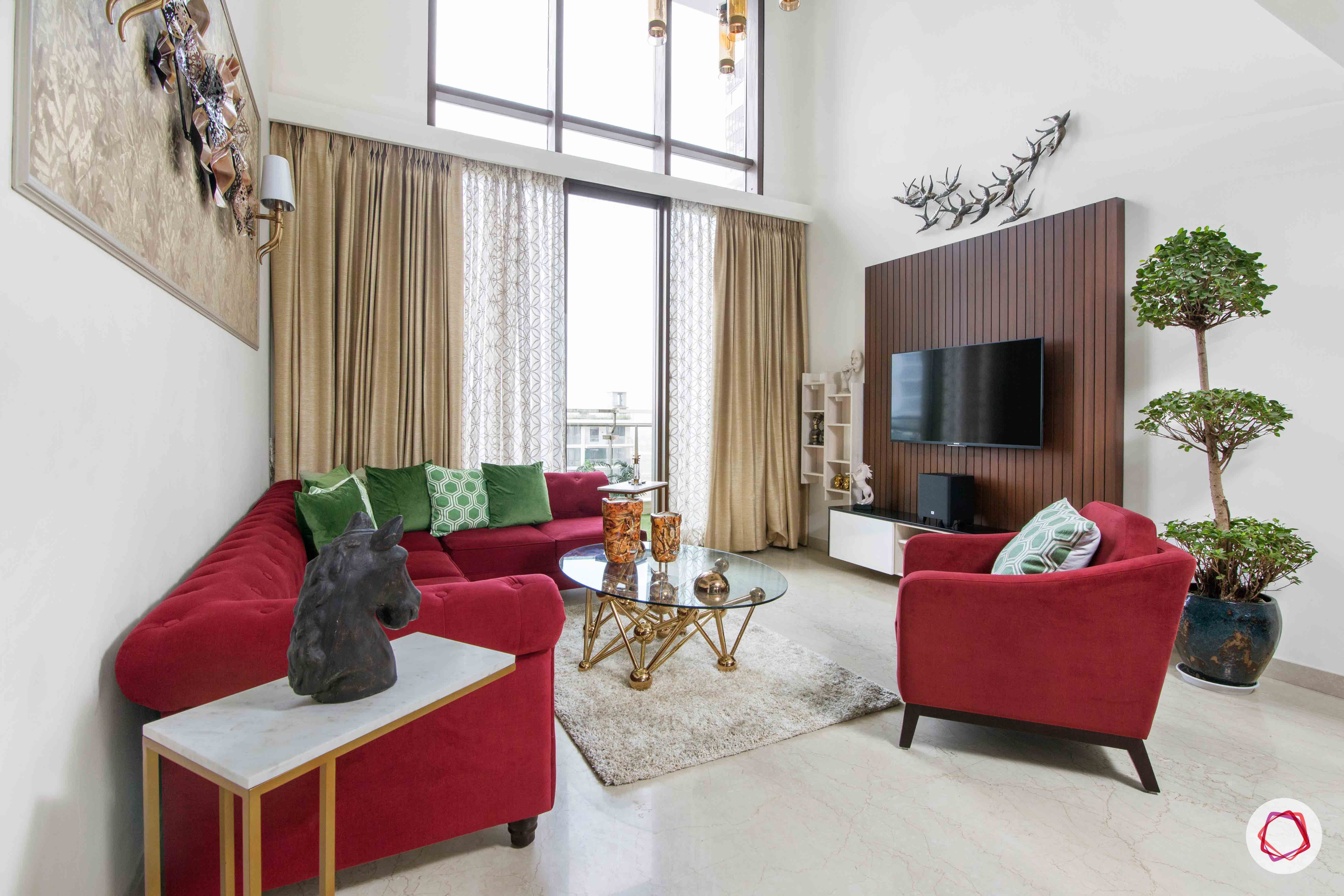 duplex house images-duplex house designs-red sofa designs-indoor plant decor ideas