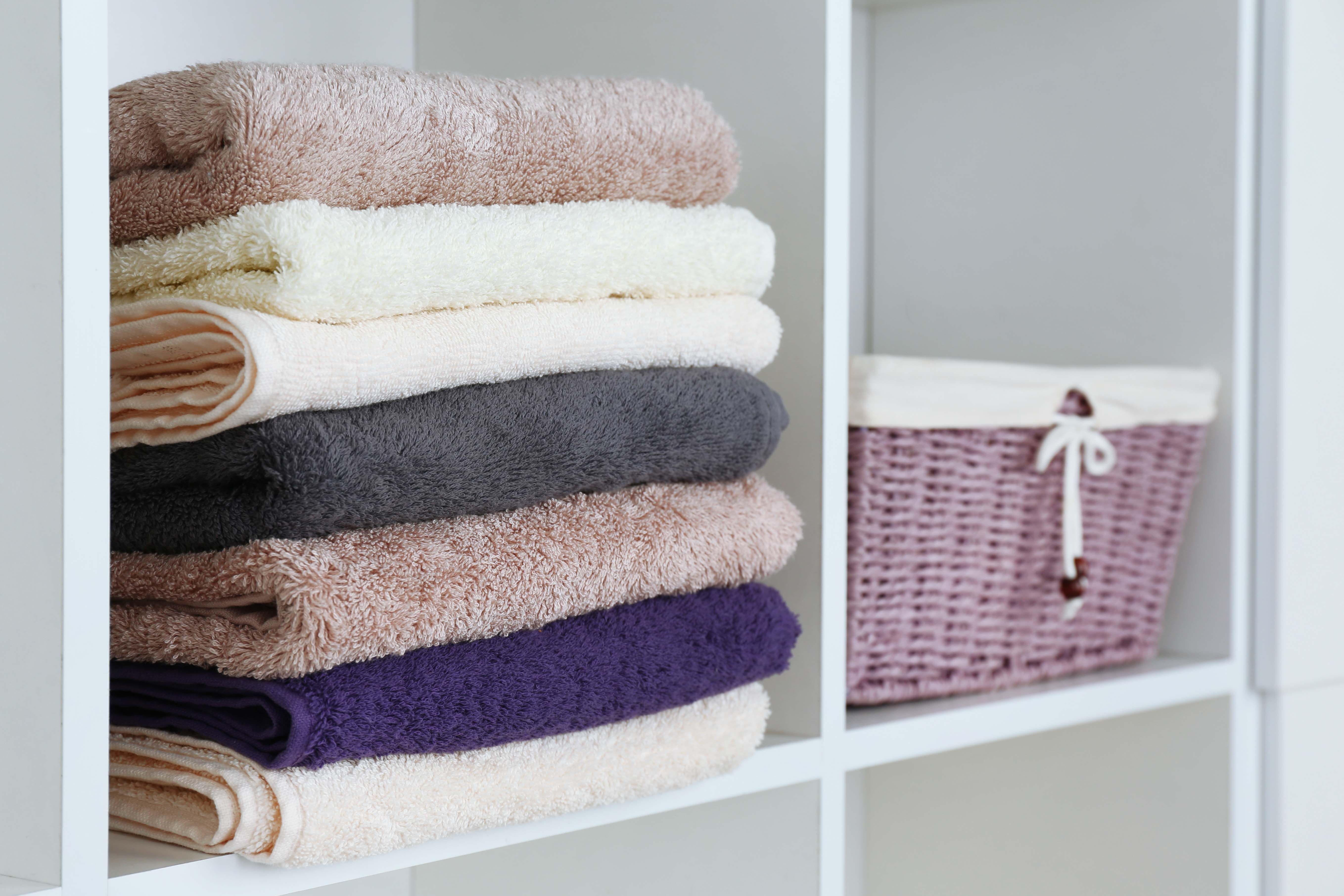 bathroom designs-bathroom linen-bath towels-towel stack-bathroom basket