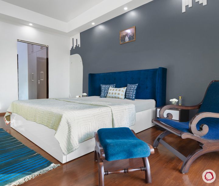 sunworld-vanalika-master-bedroom-accent-chair-bedside-rug-white-bed