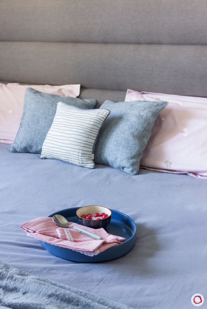 top-interior-designers-in-bangalore-master-bedroom-grey-headboard-pillows