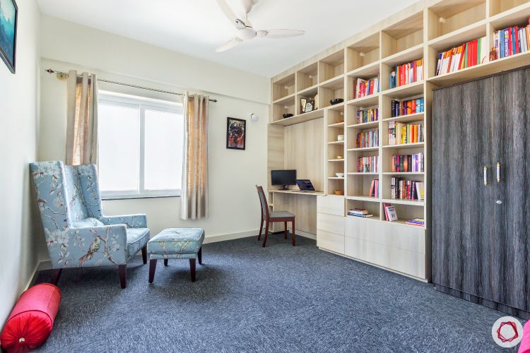 top-interior-designers-in-bangalore-wooden-bookshelf-study-room-armchair