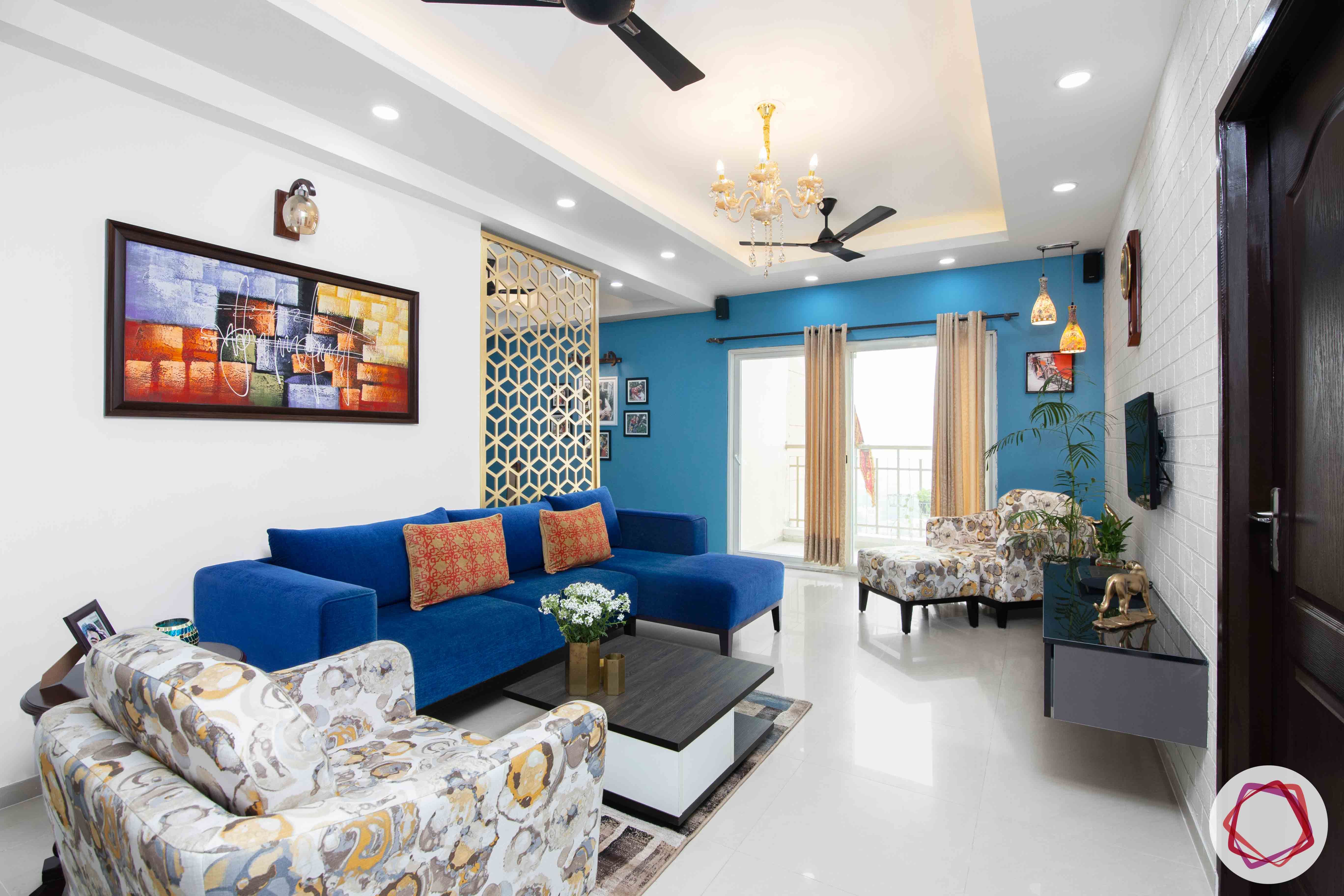 3bhk flat interior design-blue sofa design-l-shaped sofa designs-jaali partition designs
