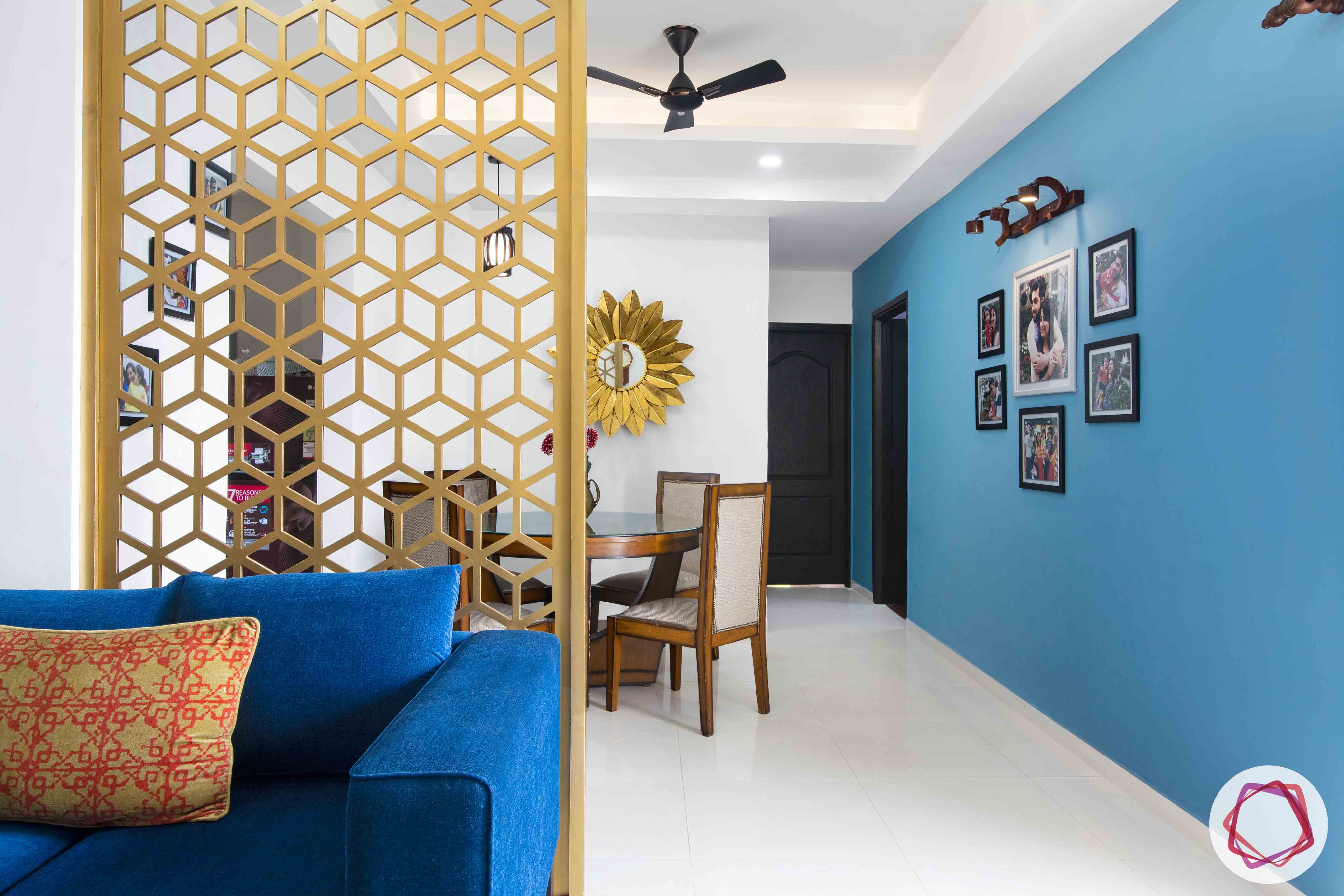 3bhk flat interior design-blue gallery wall designs-focus lights for photo frames