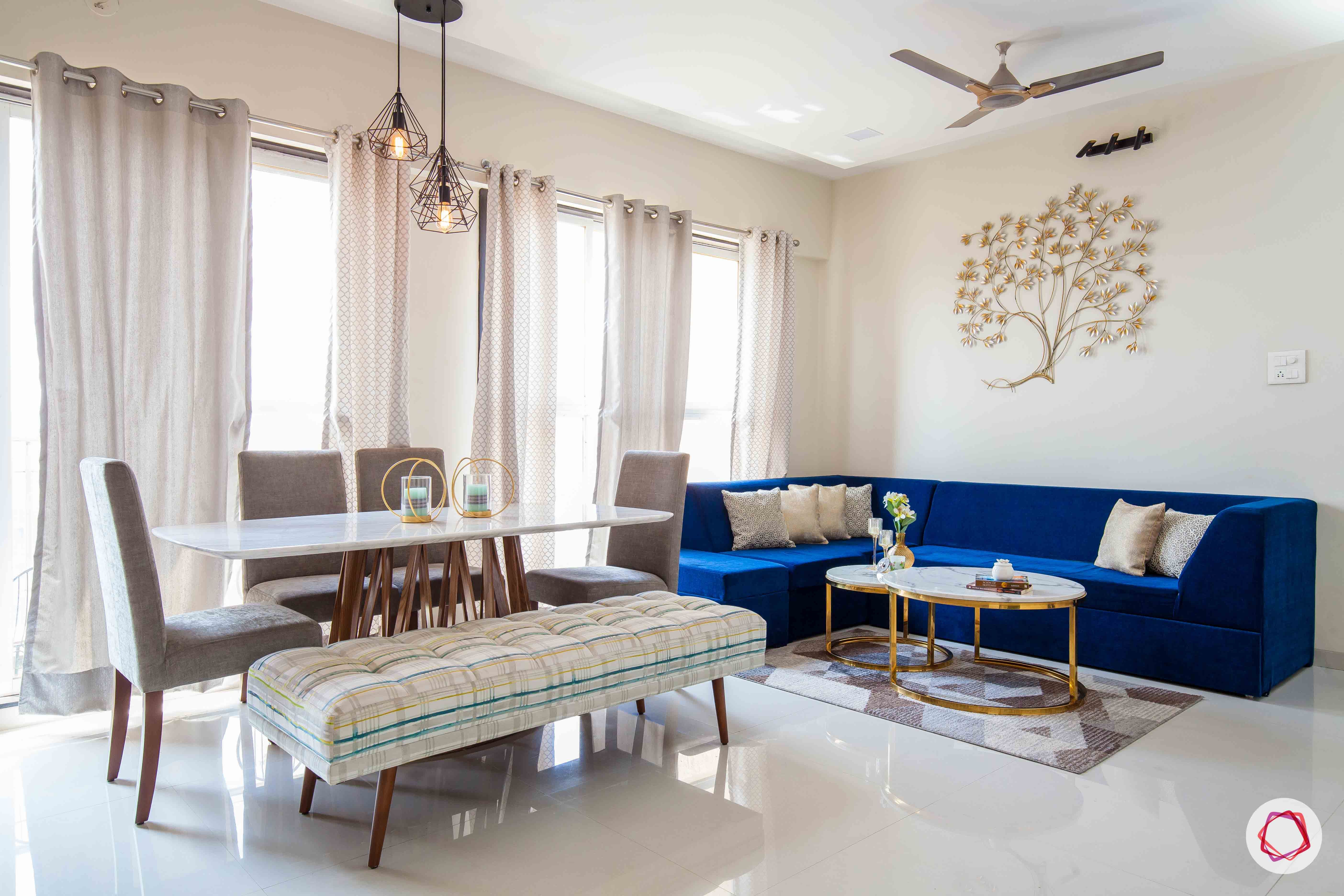 akshar elementa-living room-blue sofa-dining table