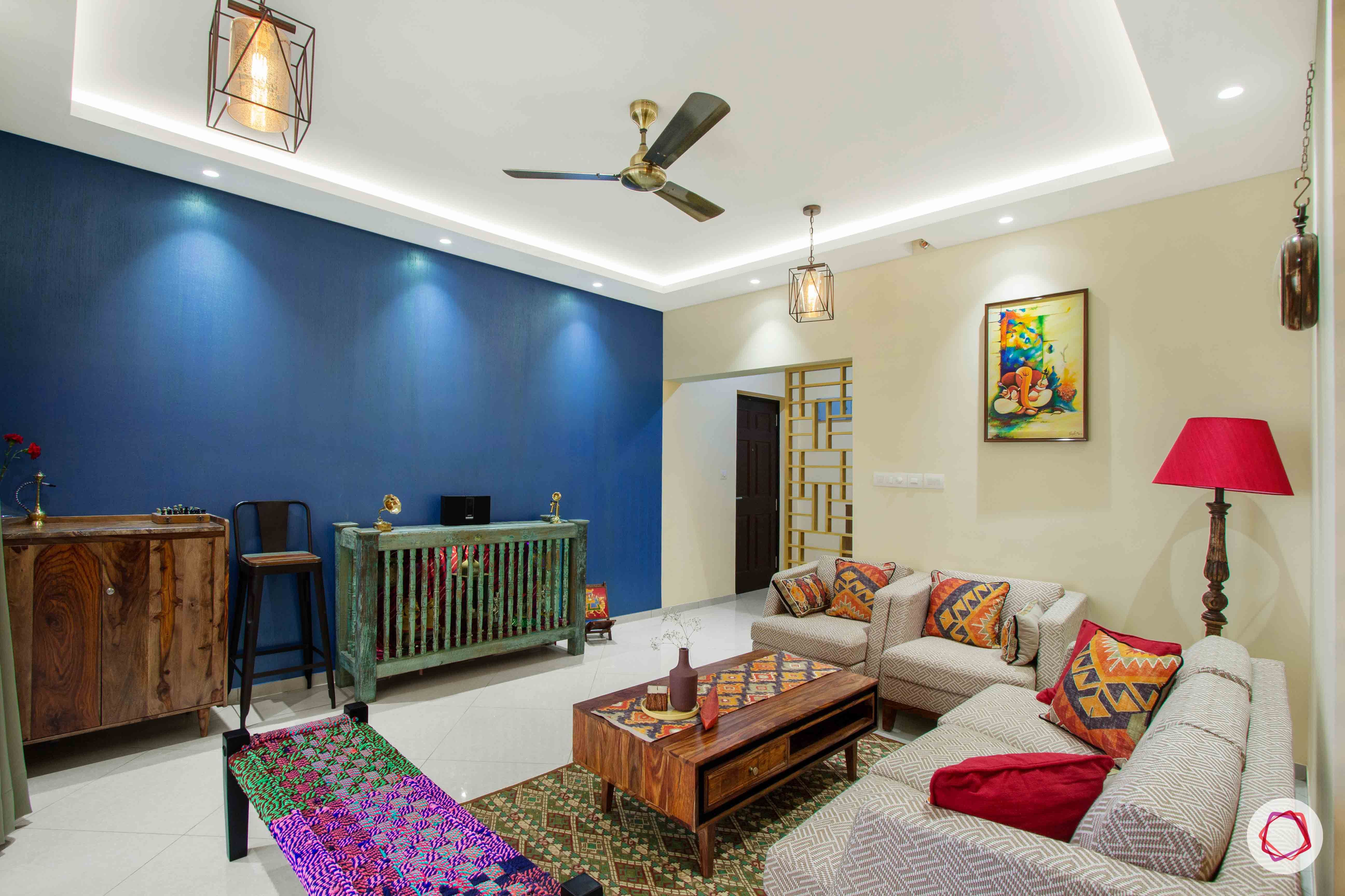 contemporary-house-design-living-room-blue-wallpaper-distressed-console-bar-unit