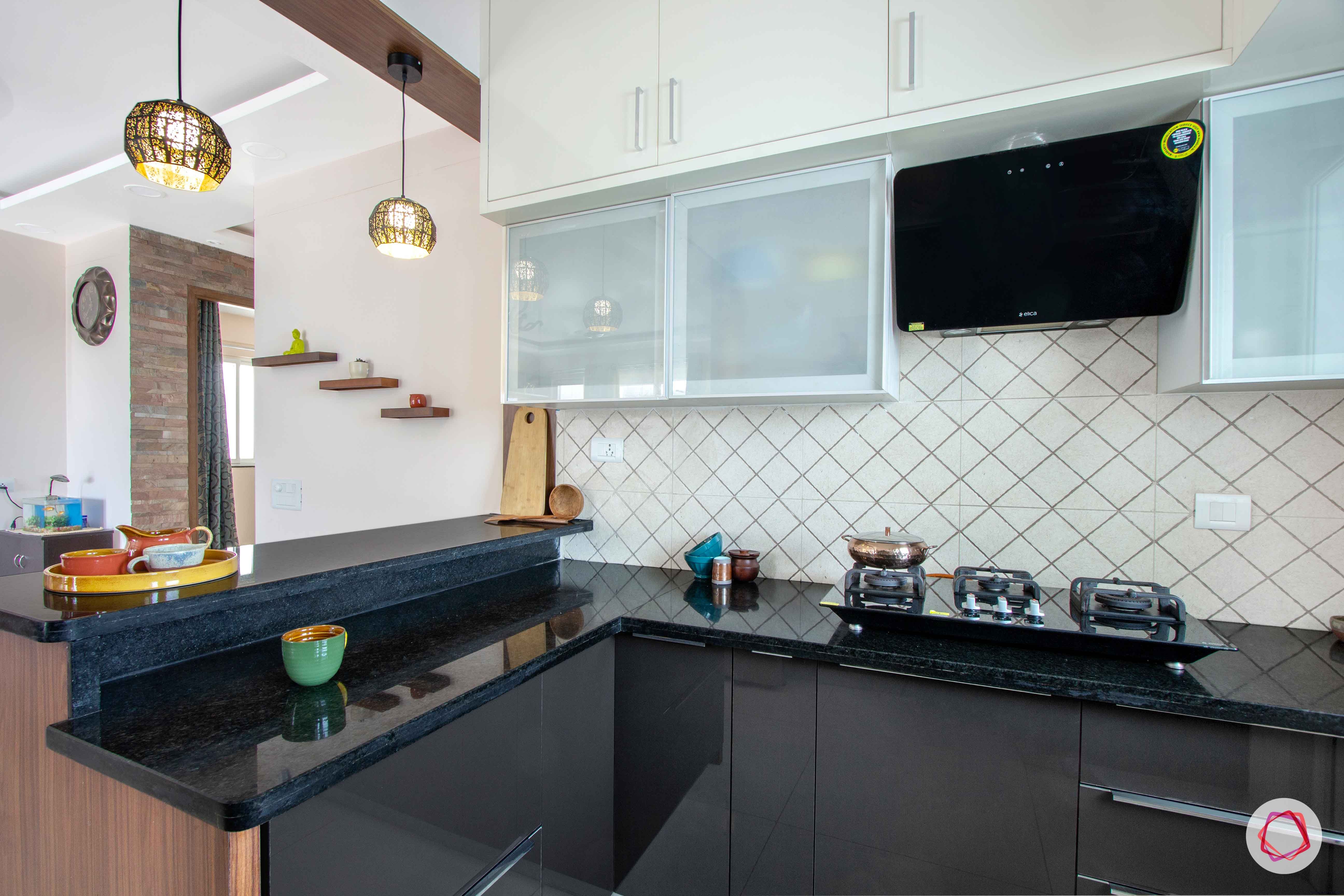 snn raj greenbay-grey kitchen cabinets-black countertop
