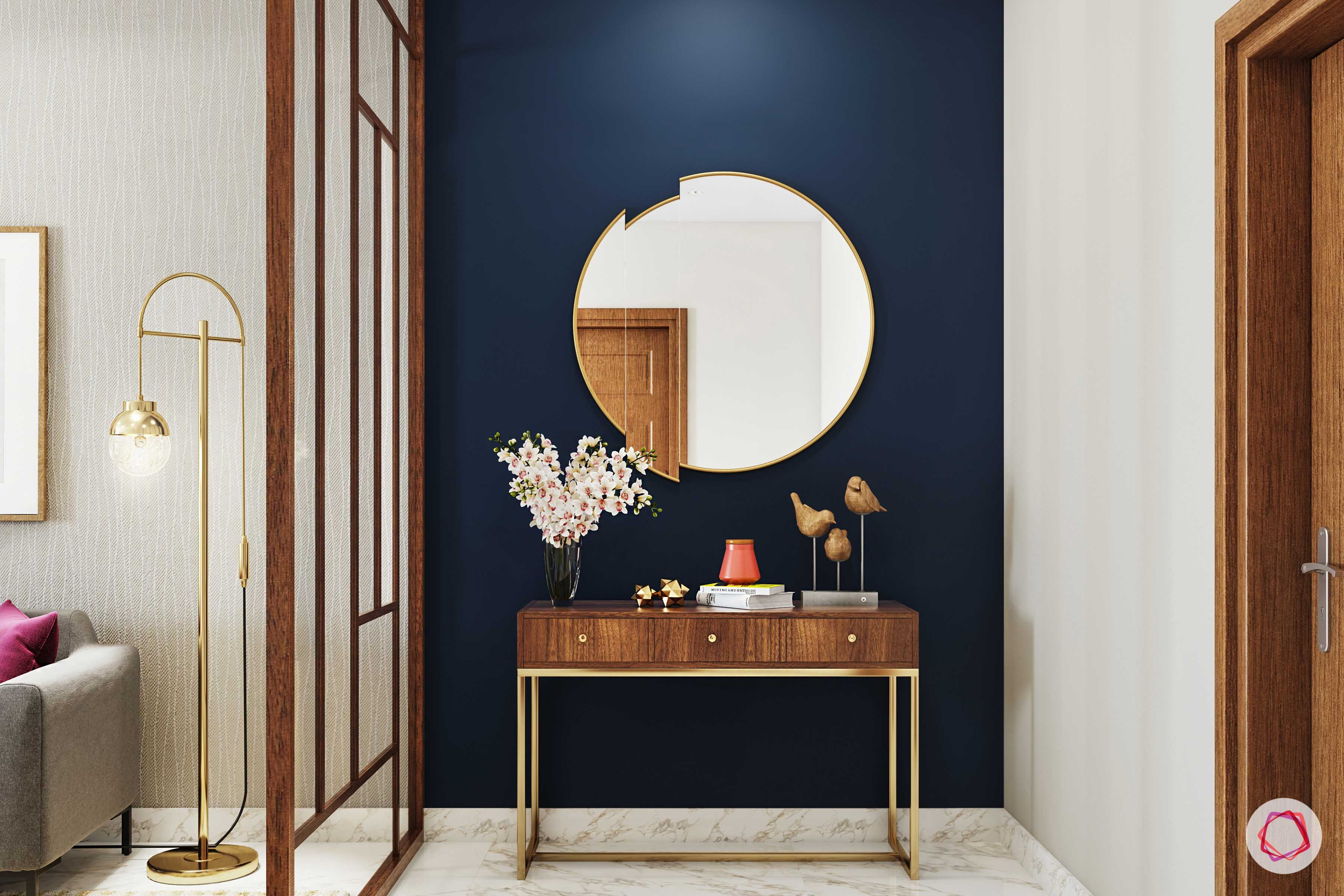 calming colors-navy blue wall paint-console designs-round mirror designs