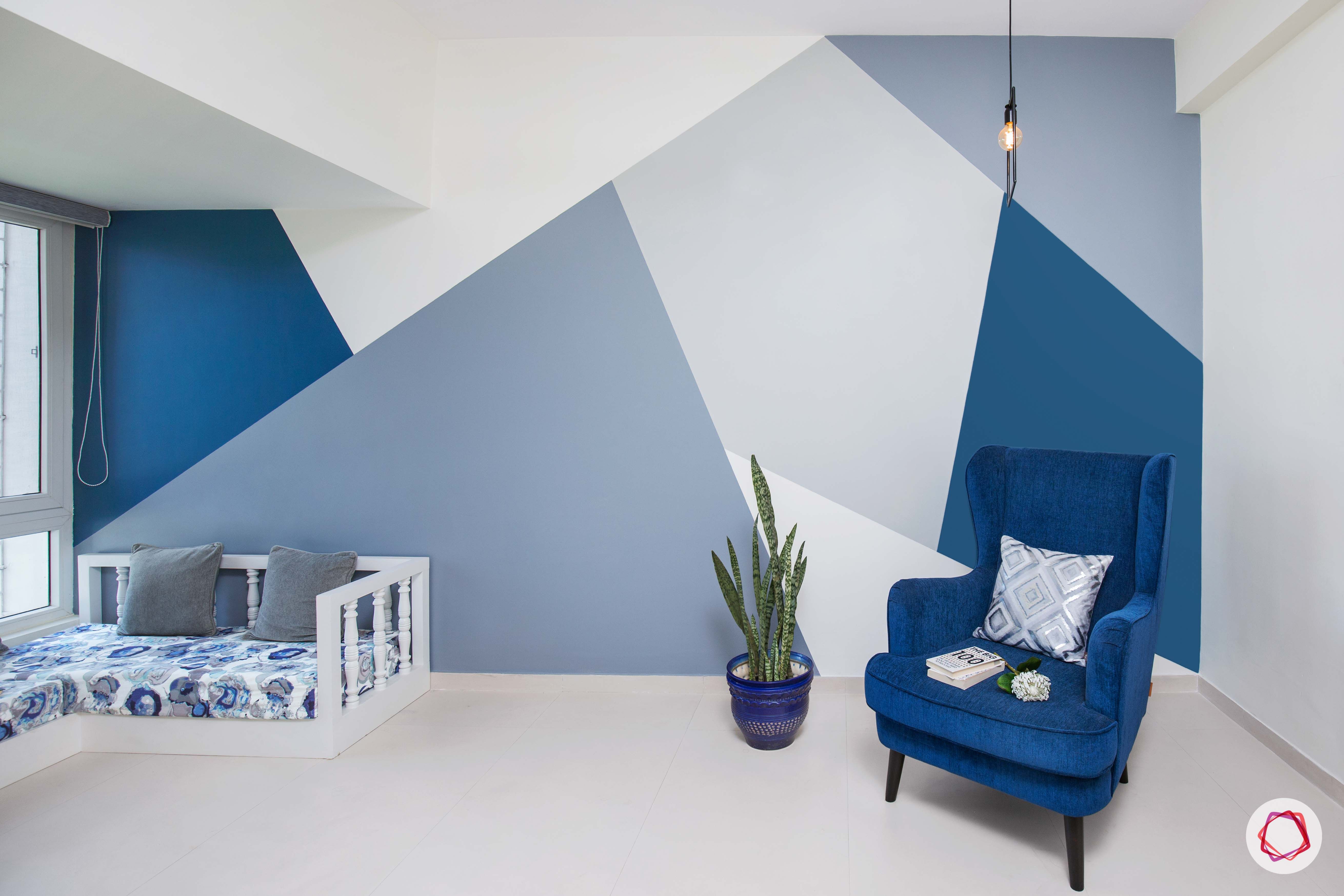 calming colors-navy blue wall paint-blue armchair designs