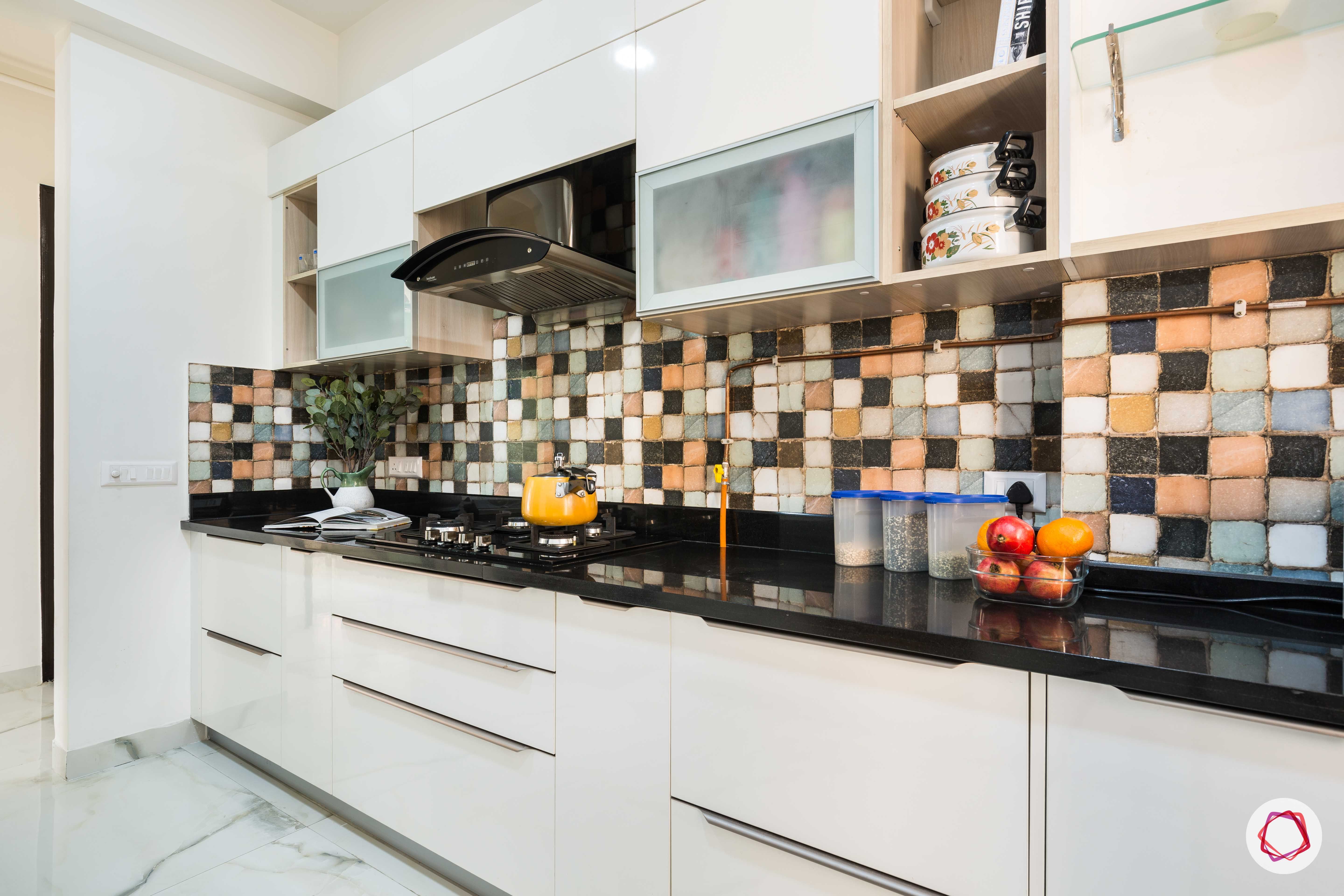 Nirala-Aspire-white-kitchen-cabinets-drawers-chimney