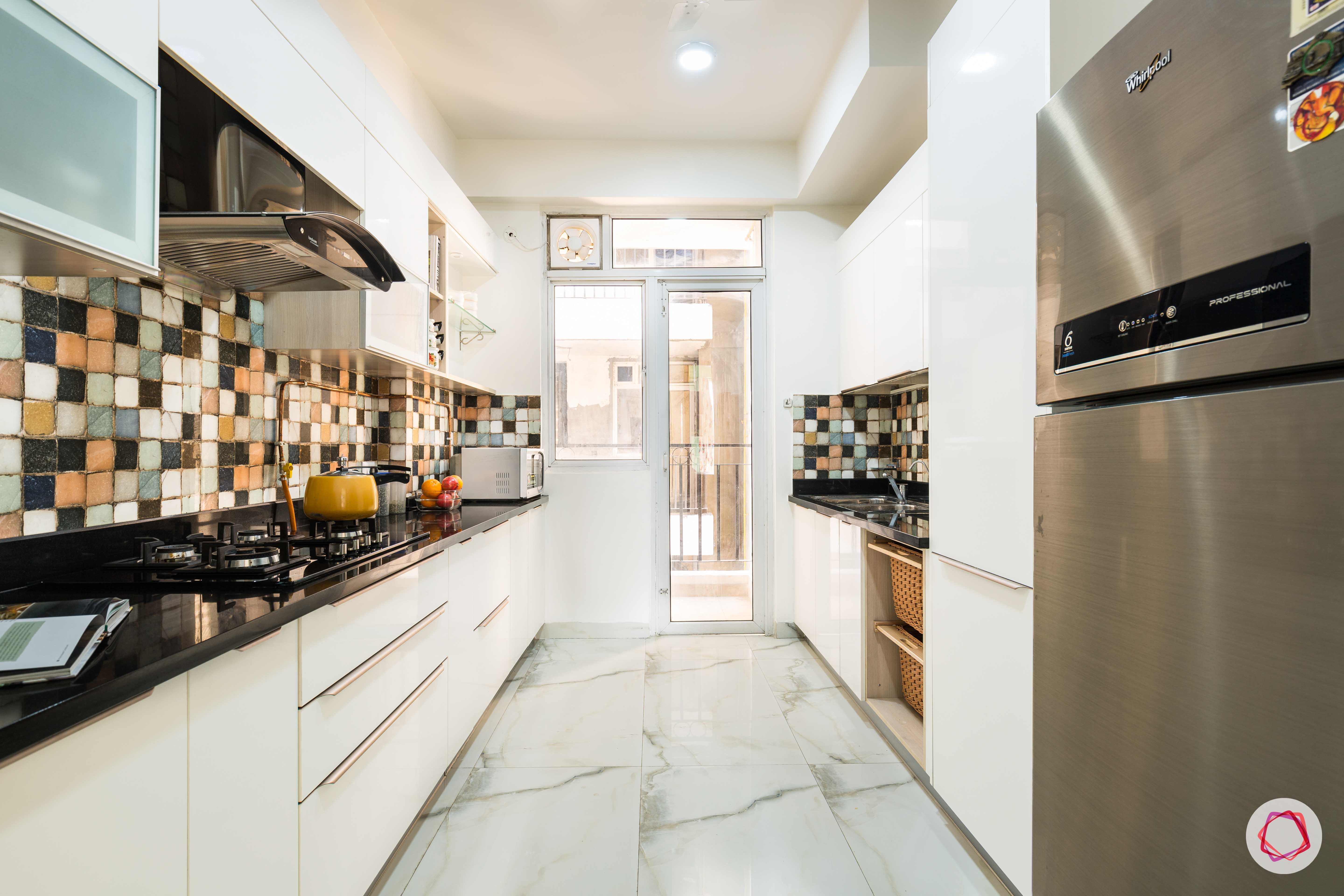 Nirala-Aspire-white-kitchen-cabinets-drawers-fridge