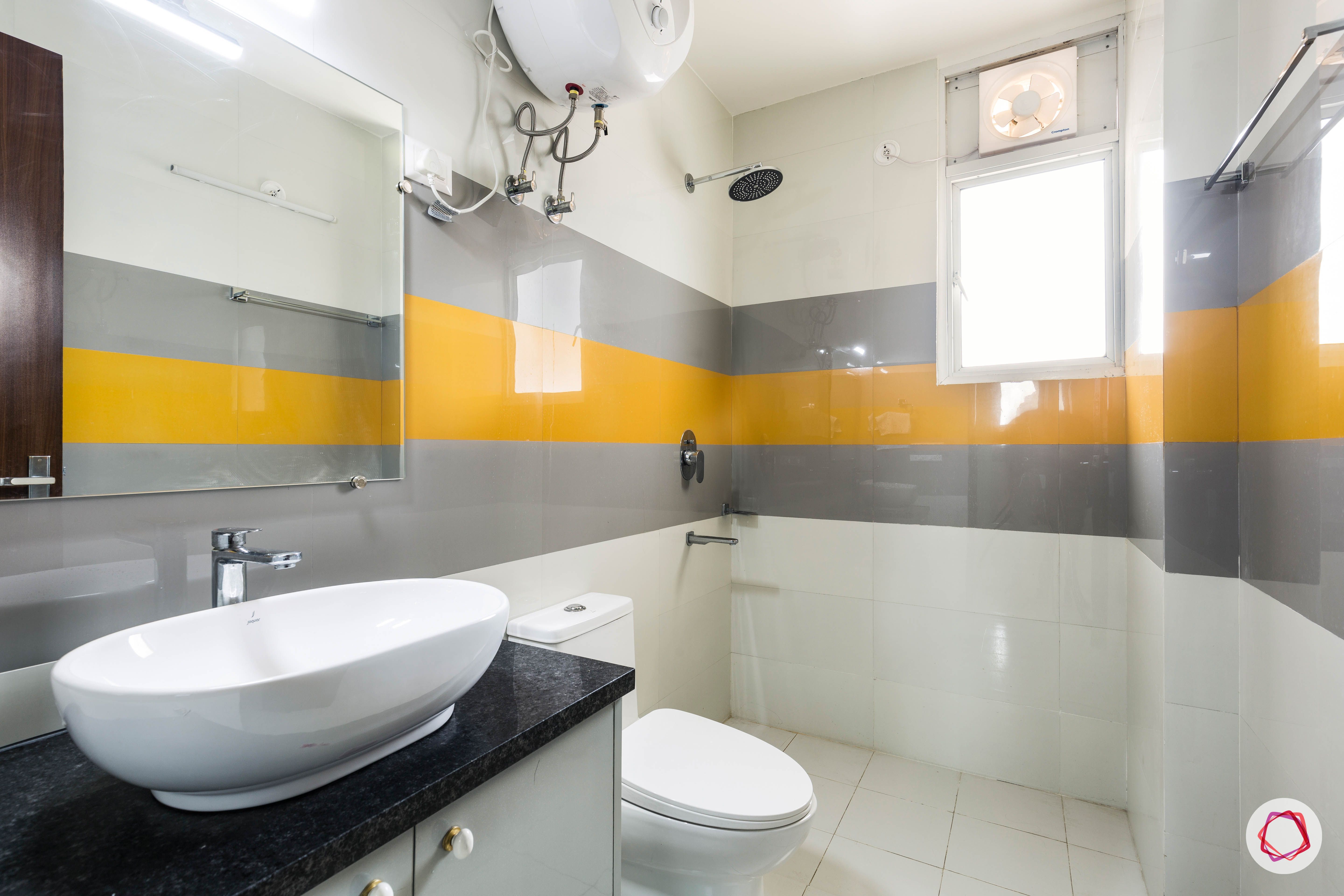 bathroom-yellow-grey-tiles-white-sink