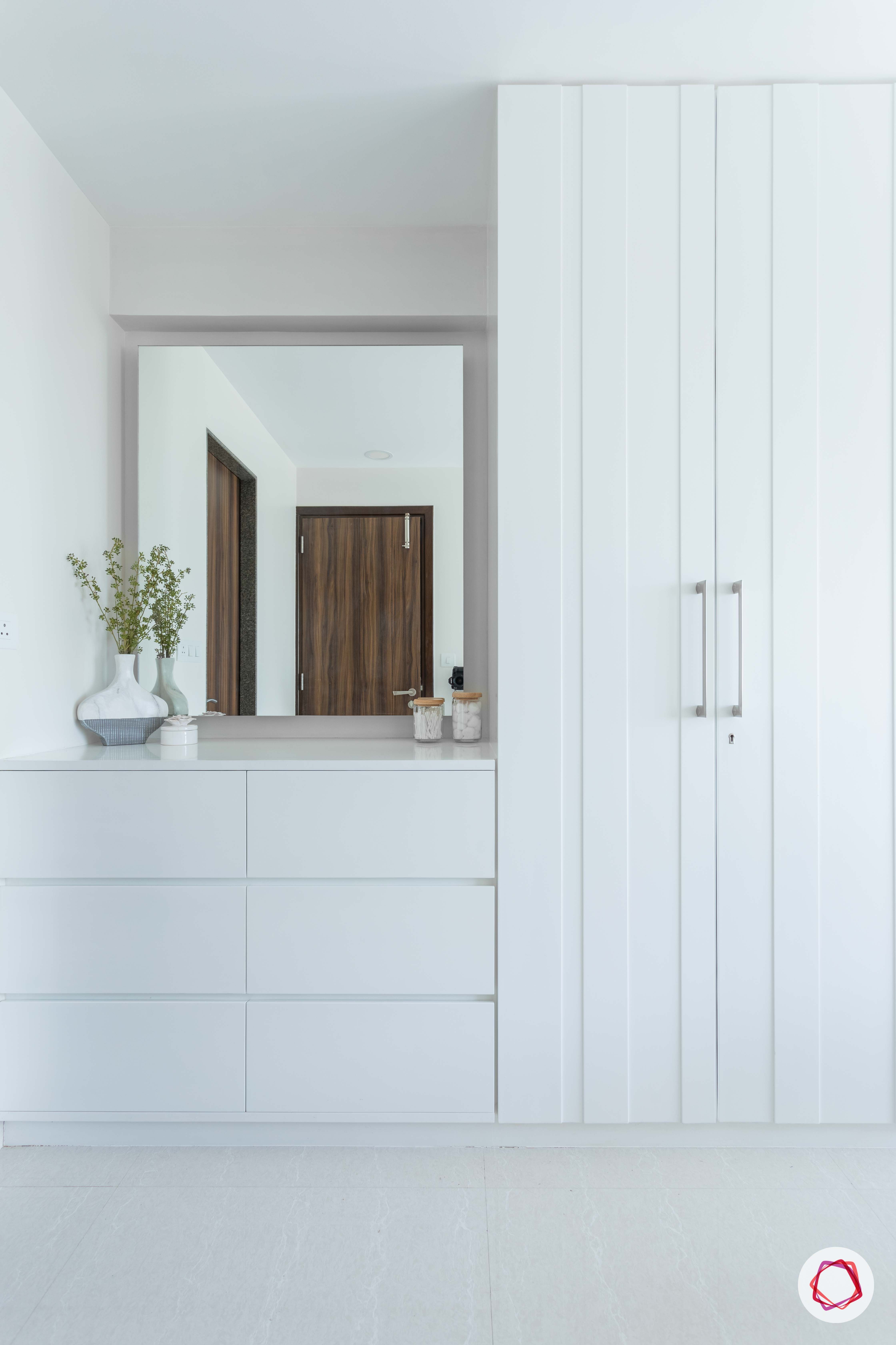 adani western-heights-white wardrobe designs-white chest of drawers
