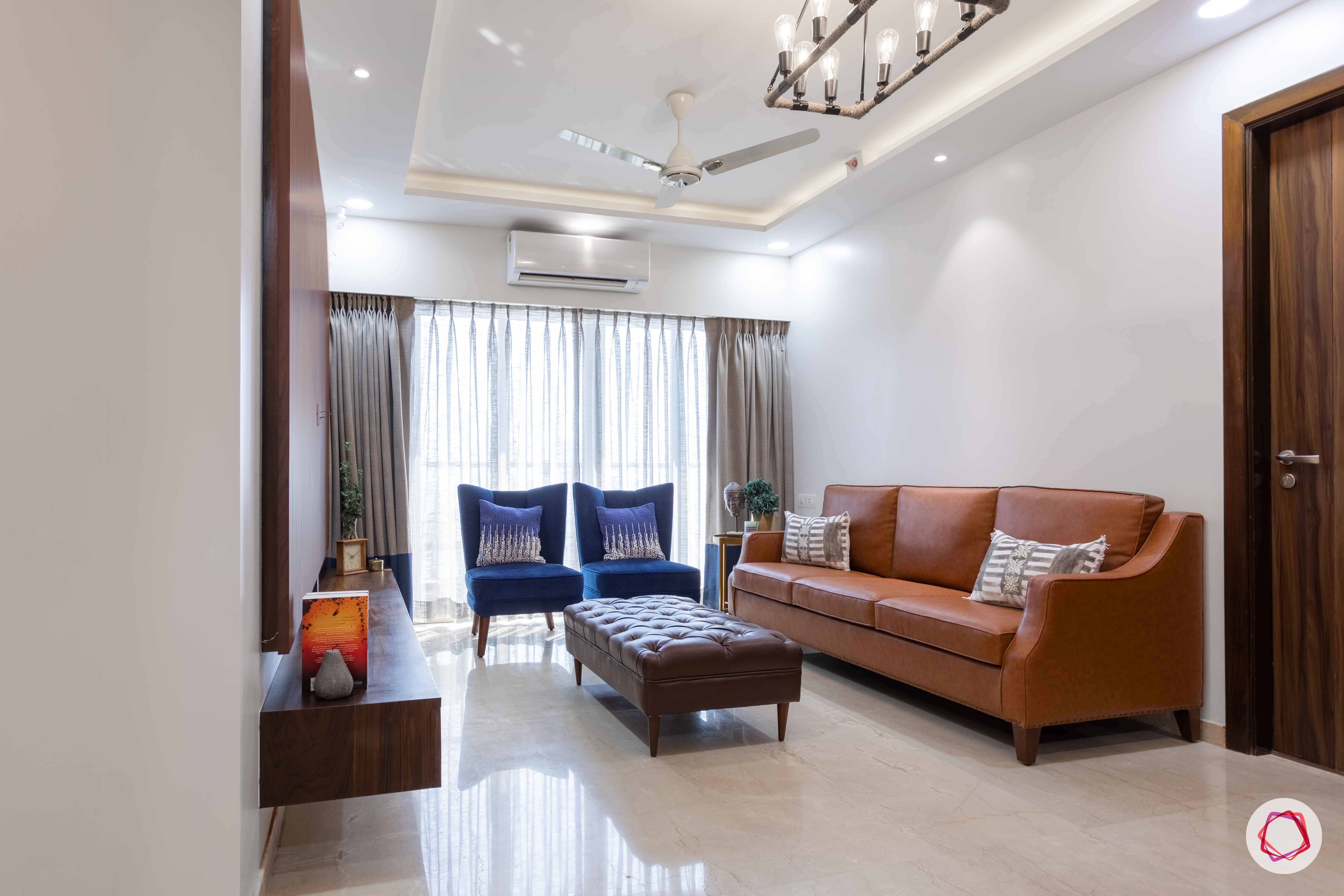 adani western-heights-leather sofa designs-tufted sofa designs