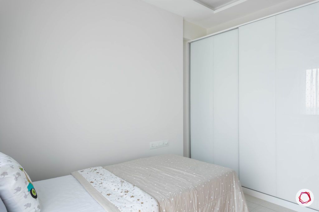 adani western-heights-sliding wardrobe designs-white wardrobe designs