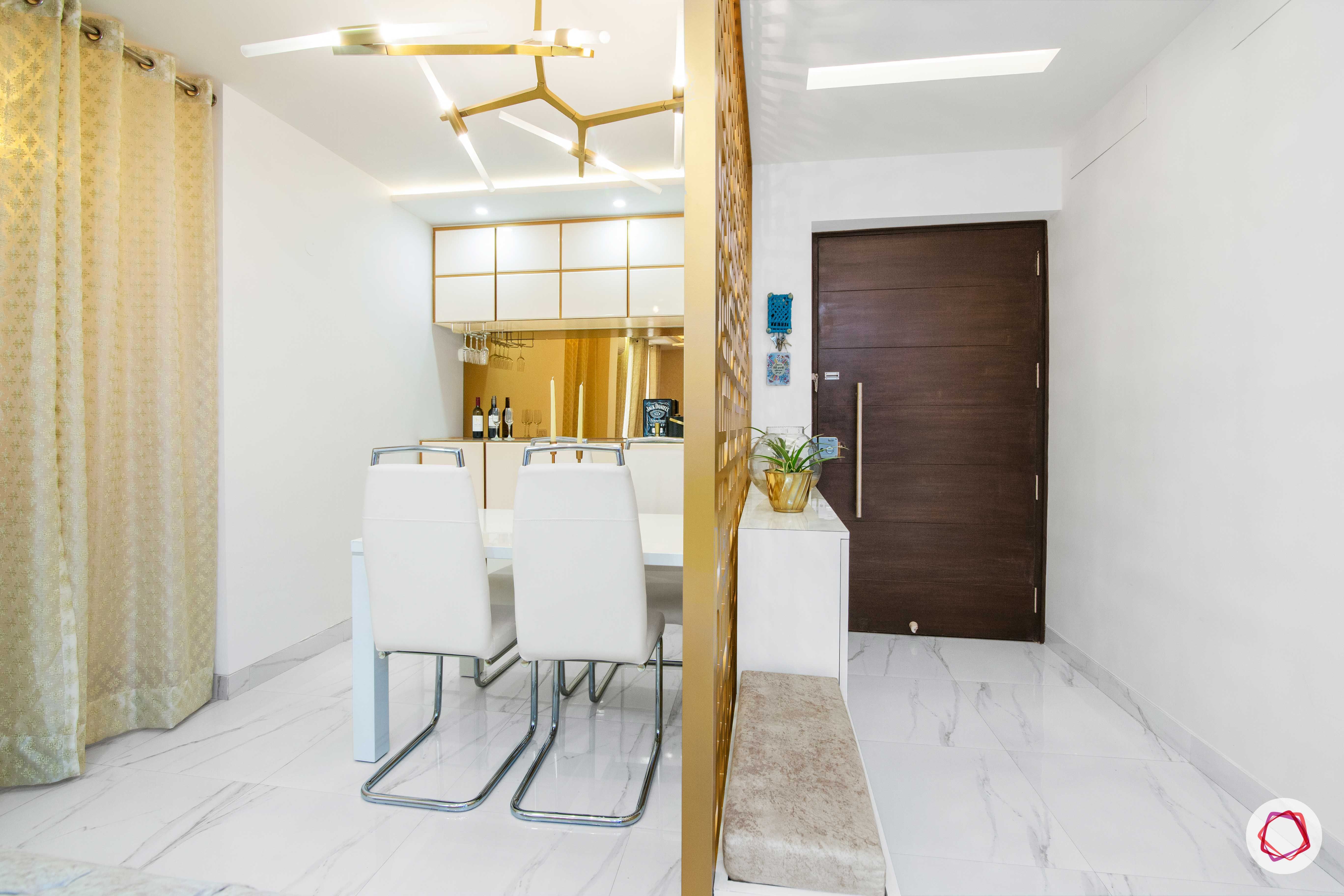 tdi ourania_dining room_white wall_white chairs_white table