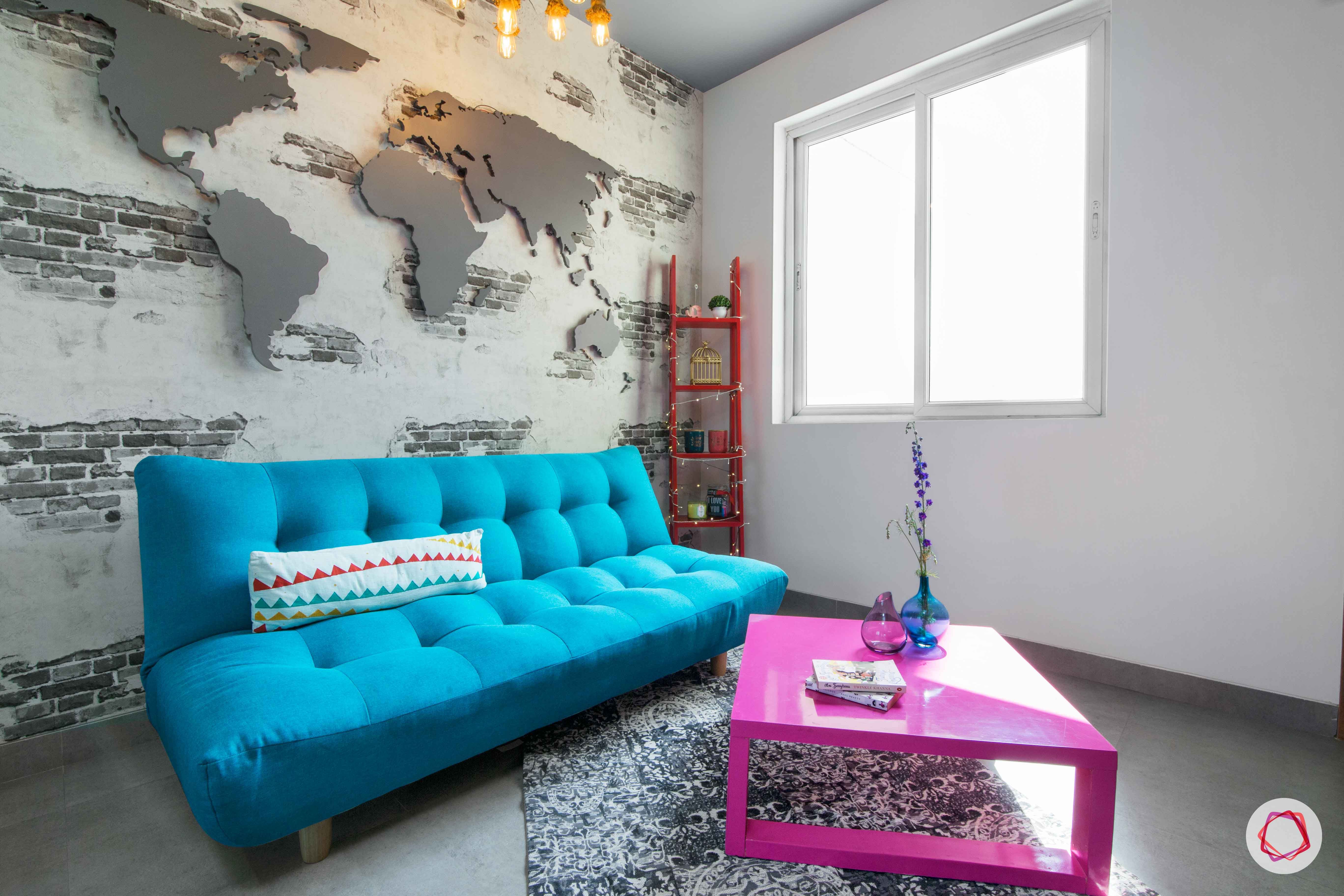 beautiful house design-blue sofa-world map wall-pink coffee table