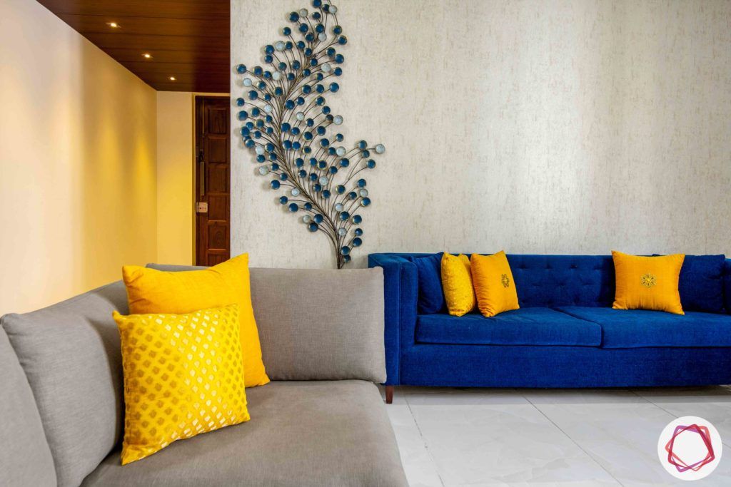 Shipra Srishti-living-room-blue-yellow-sofa-pillows