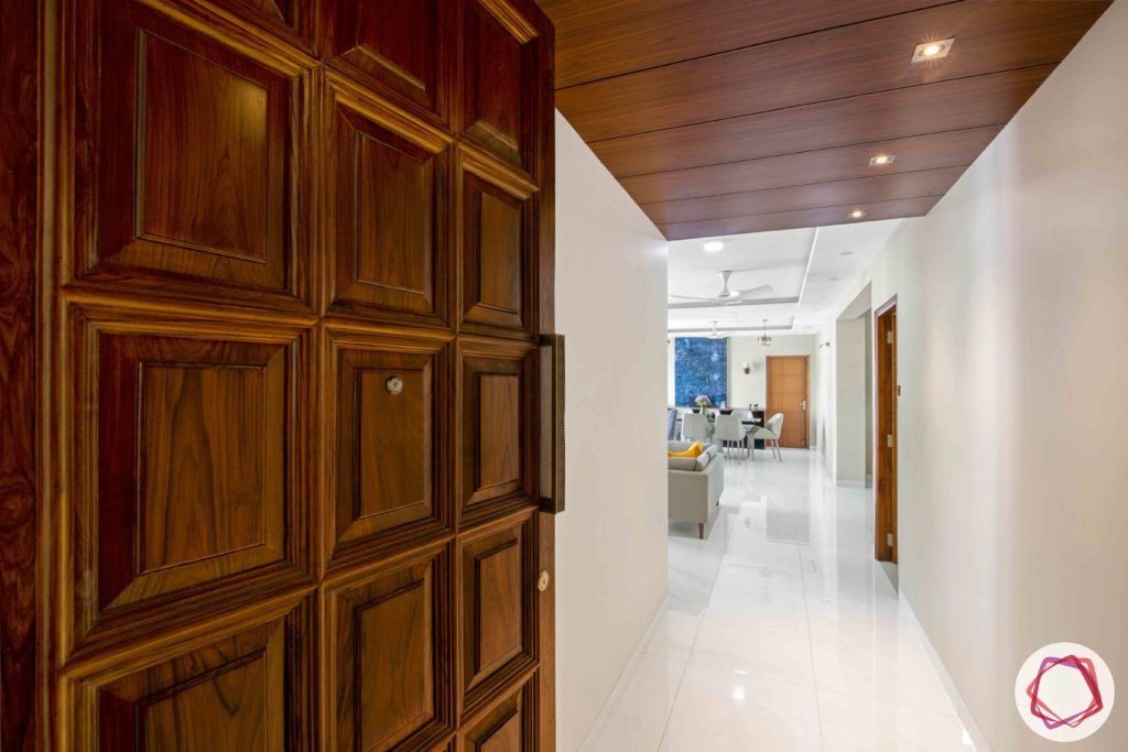 Shipra Srishti-entrance-door-wooden-spotlights