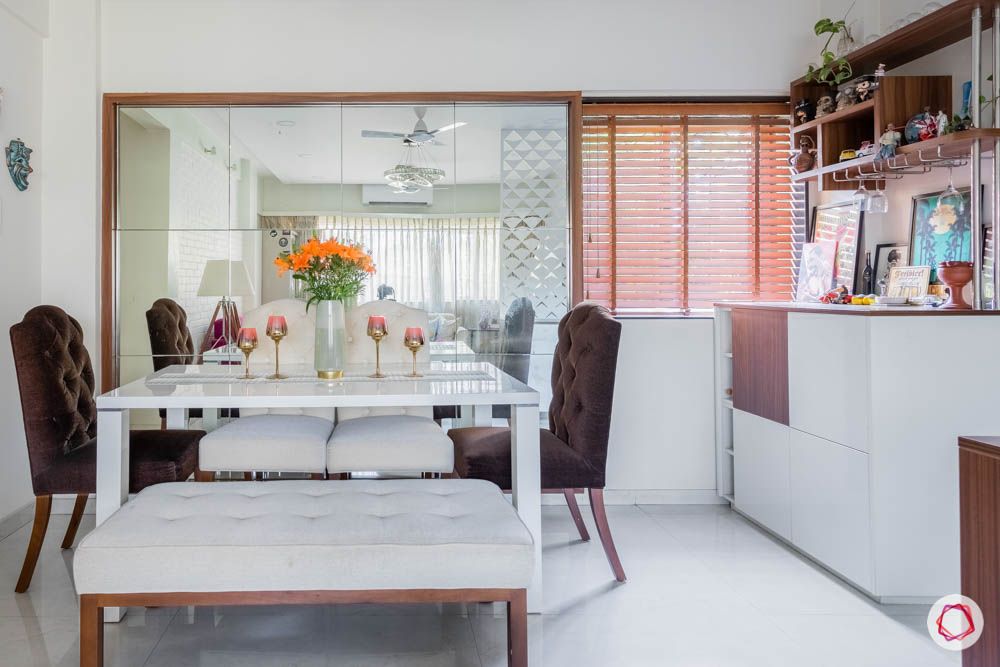 modern house images-dining room-mirror wall panel-brown chairs-white dining table