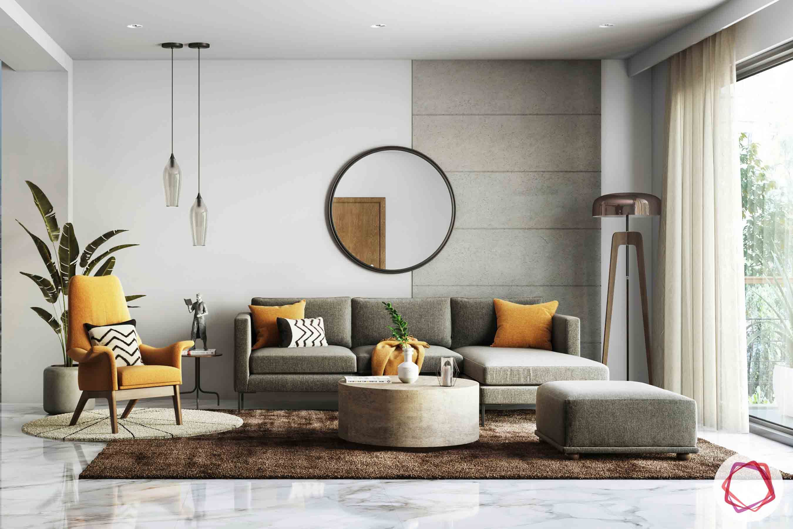 john abraham-grey sofa designs-orange armchair designs-round centre table designs