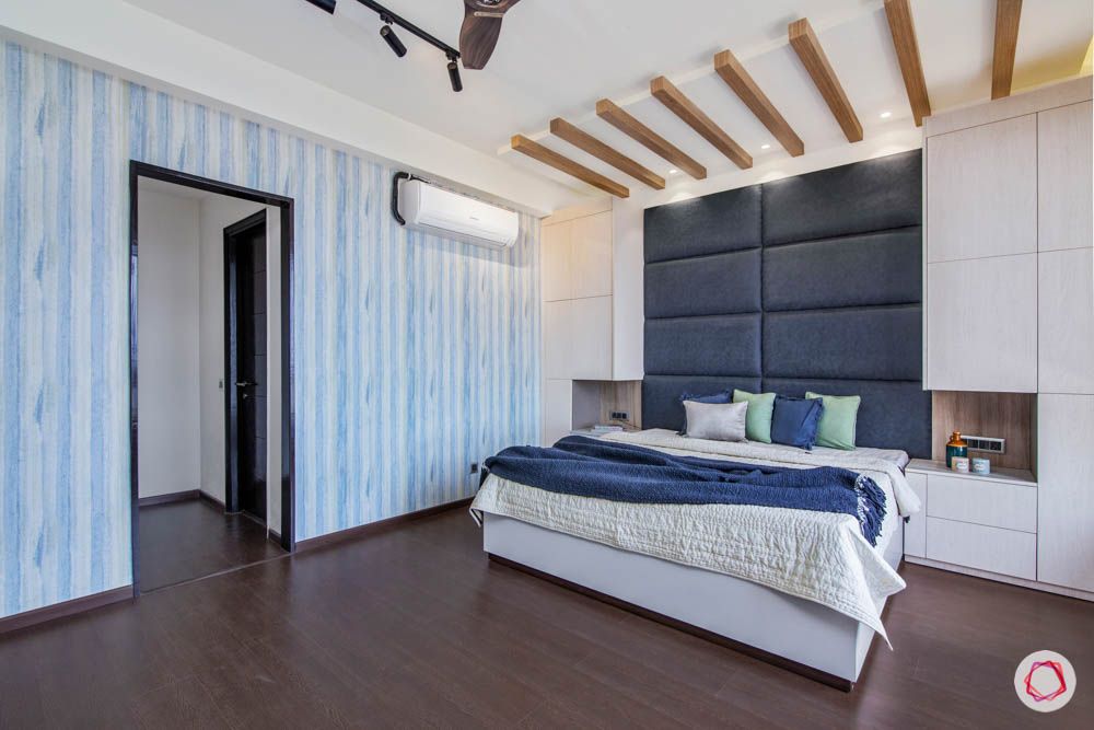 jaypee greens noida-wooden flooring designs-blue headboard designs