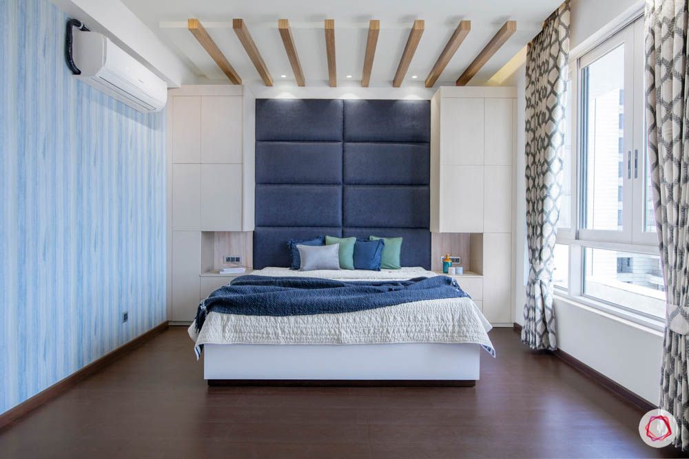  jaypee greens noida-wooden rafter designs-blue headboard designs