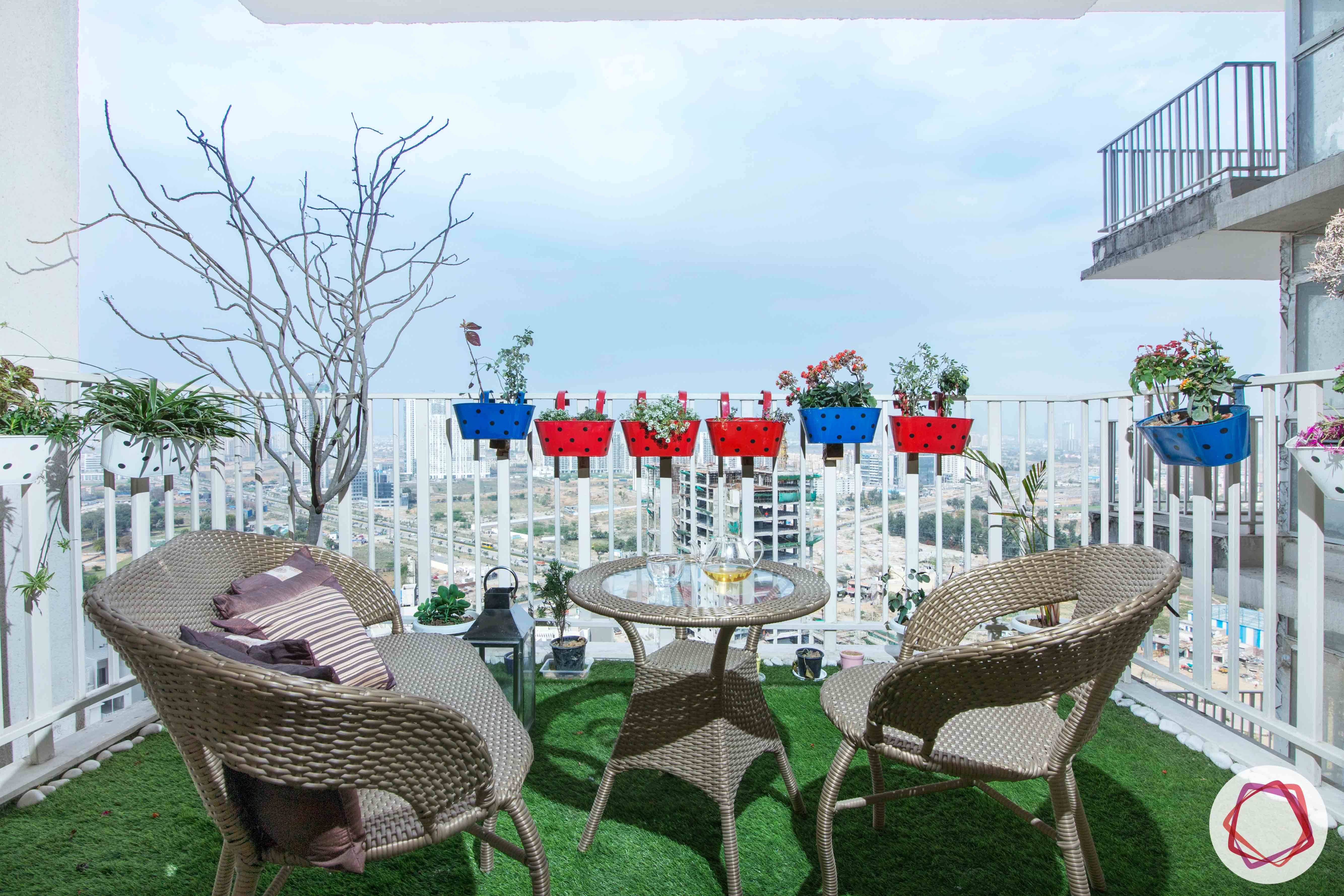 ireo victory valley-balcony-cane furniture-colourful planters