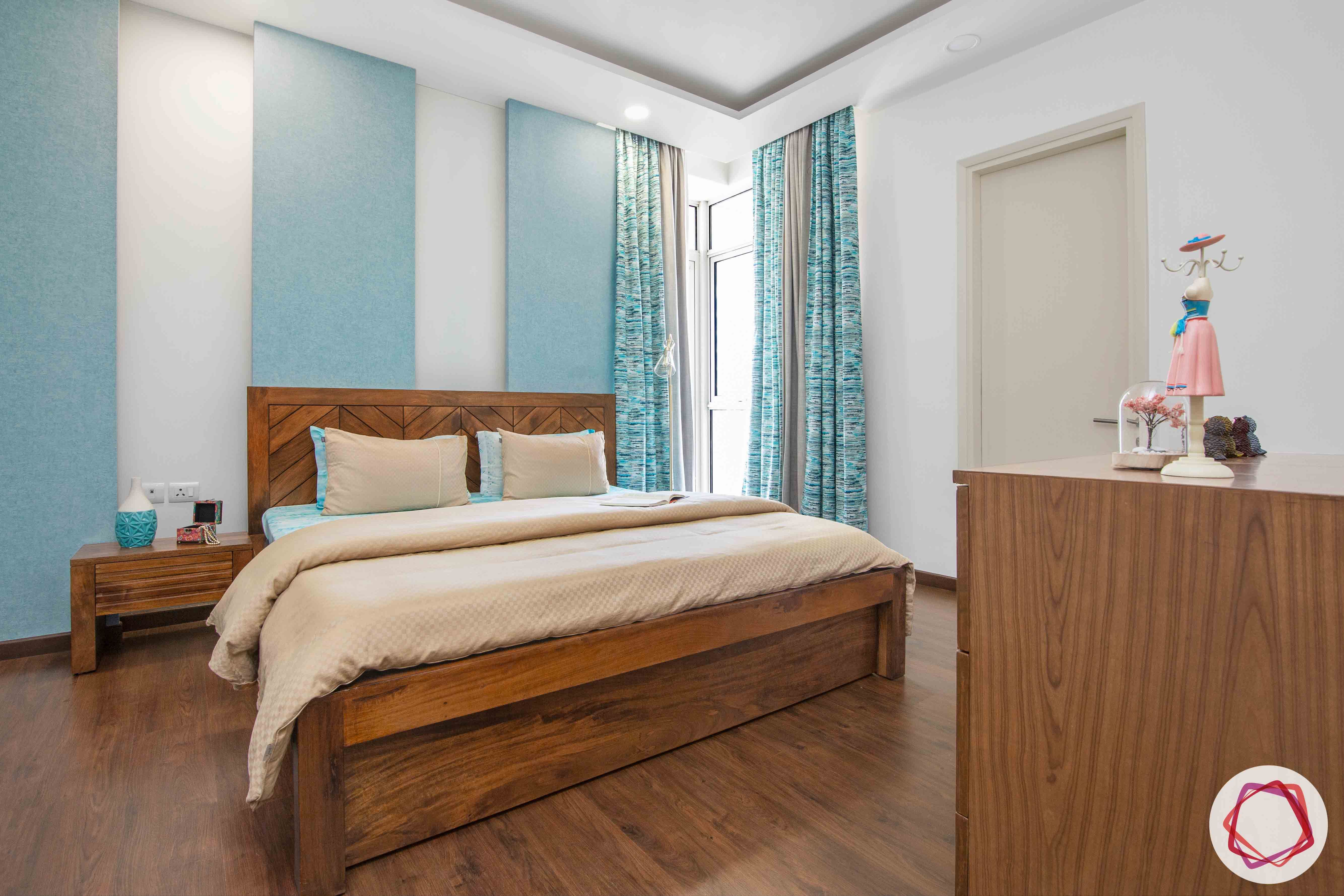ireo victory valley-master bedroom-blue wall panels-wooden bed