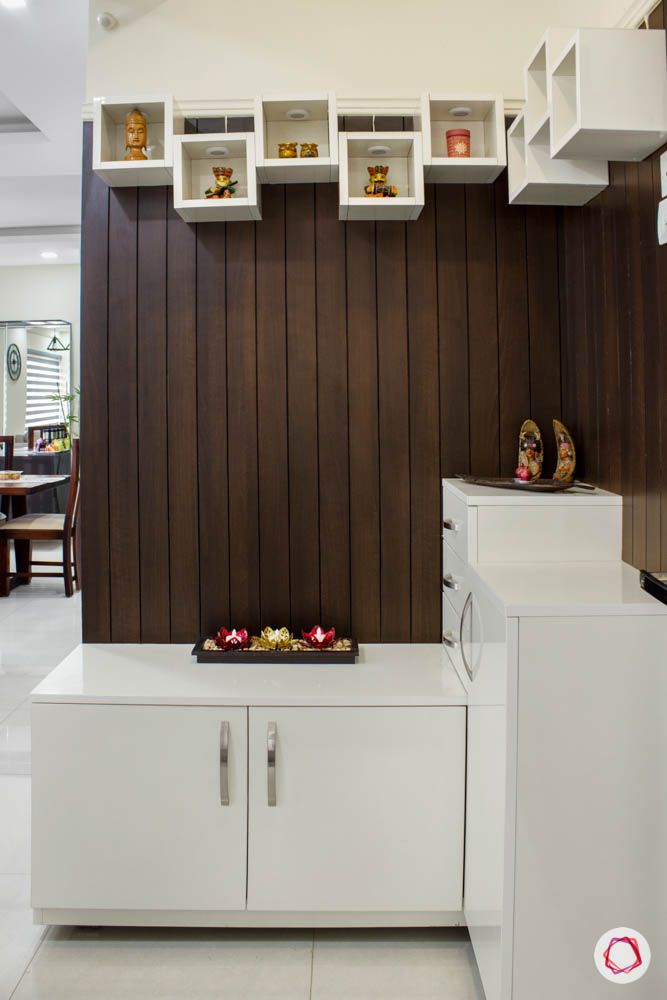 Vaswani Brentwood-foyer-shoe-cabinet-wood-wall-open-shelves-artefacts