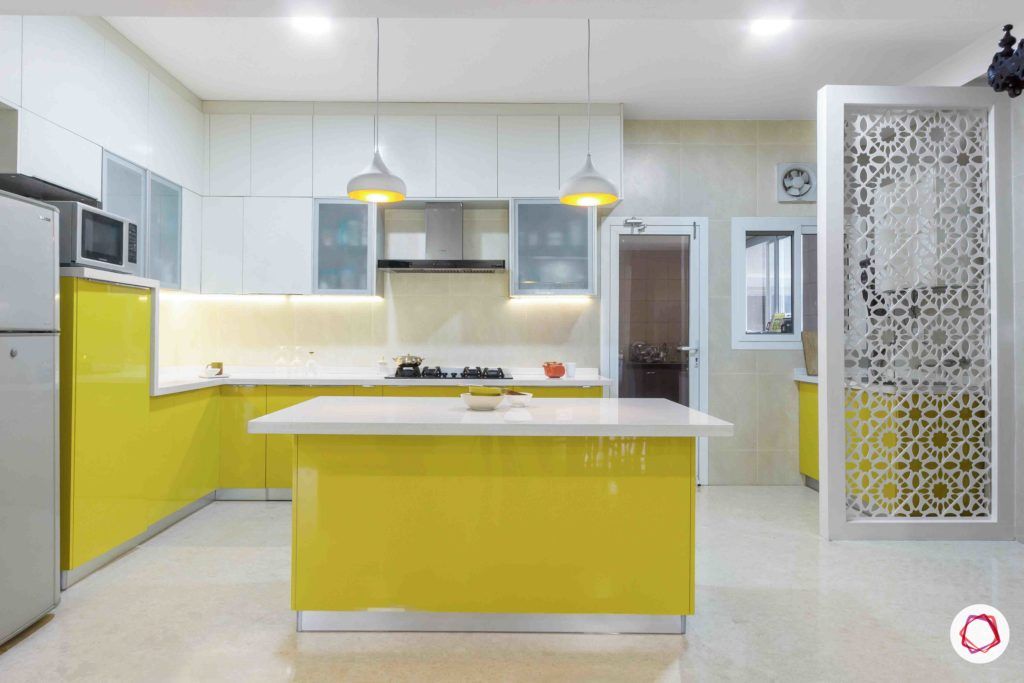 kitchen-yellow-white-lights-jali-cabinets-close-storage-frosted-glass-white-tiles