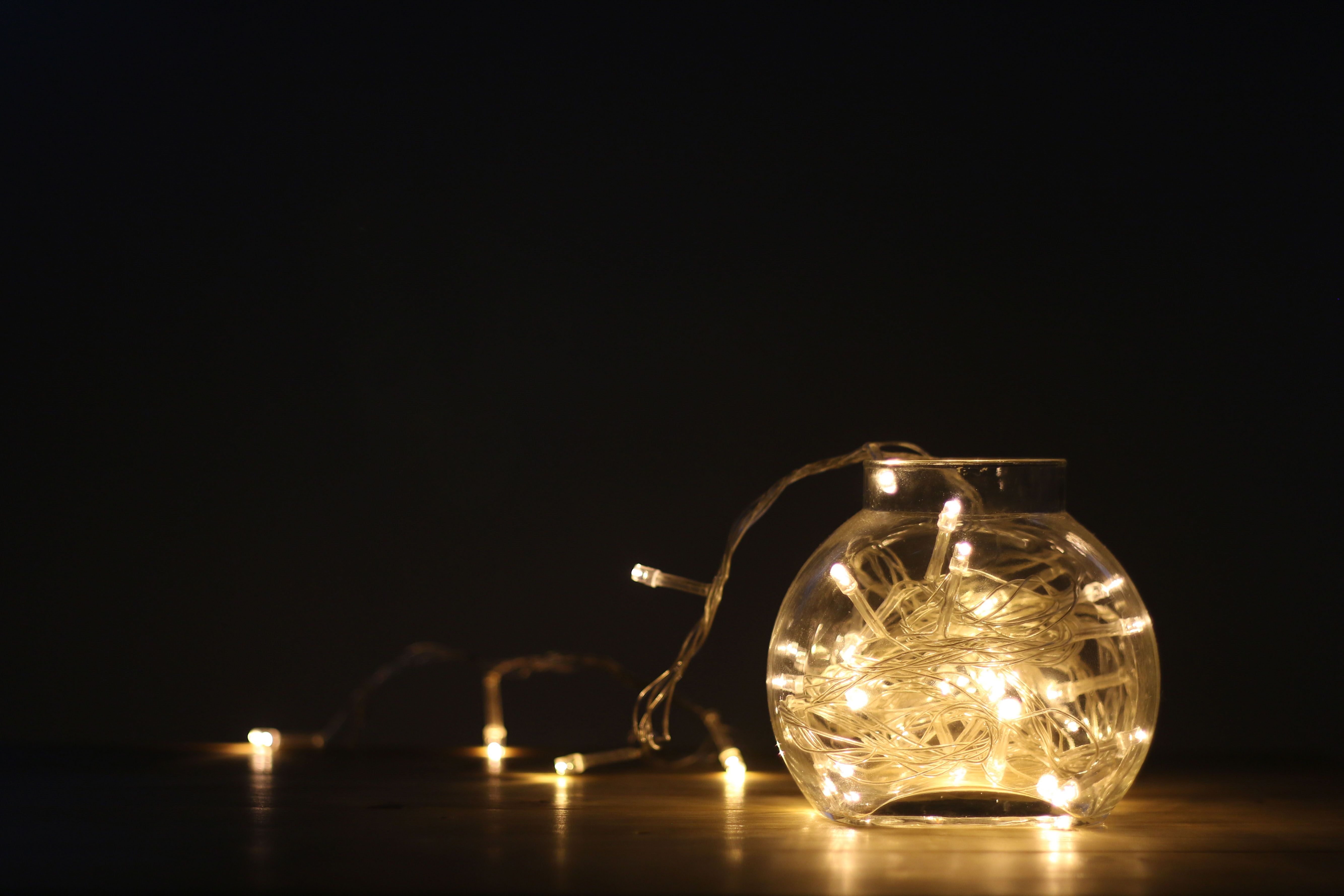corner light-fairy lights in jar-string light decoration ideas