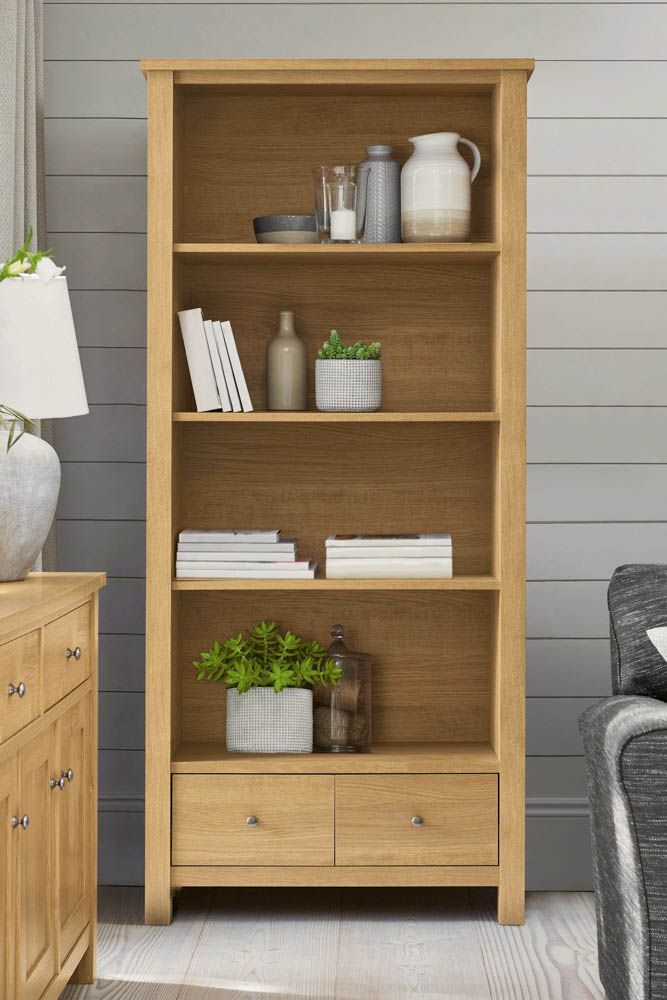 tall-cabinet-wood-open-shelves-vases-plant-glass-sofa