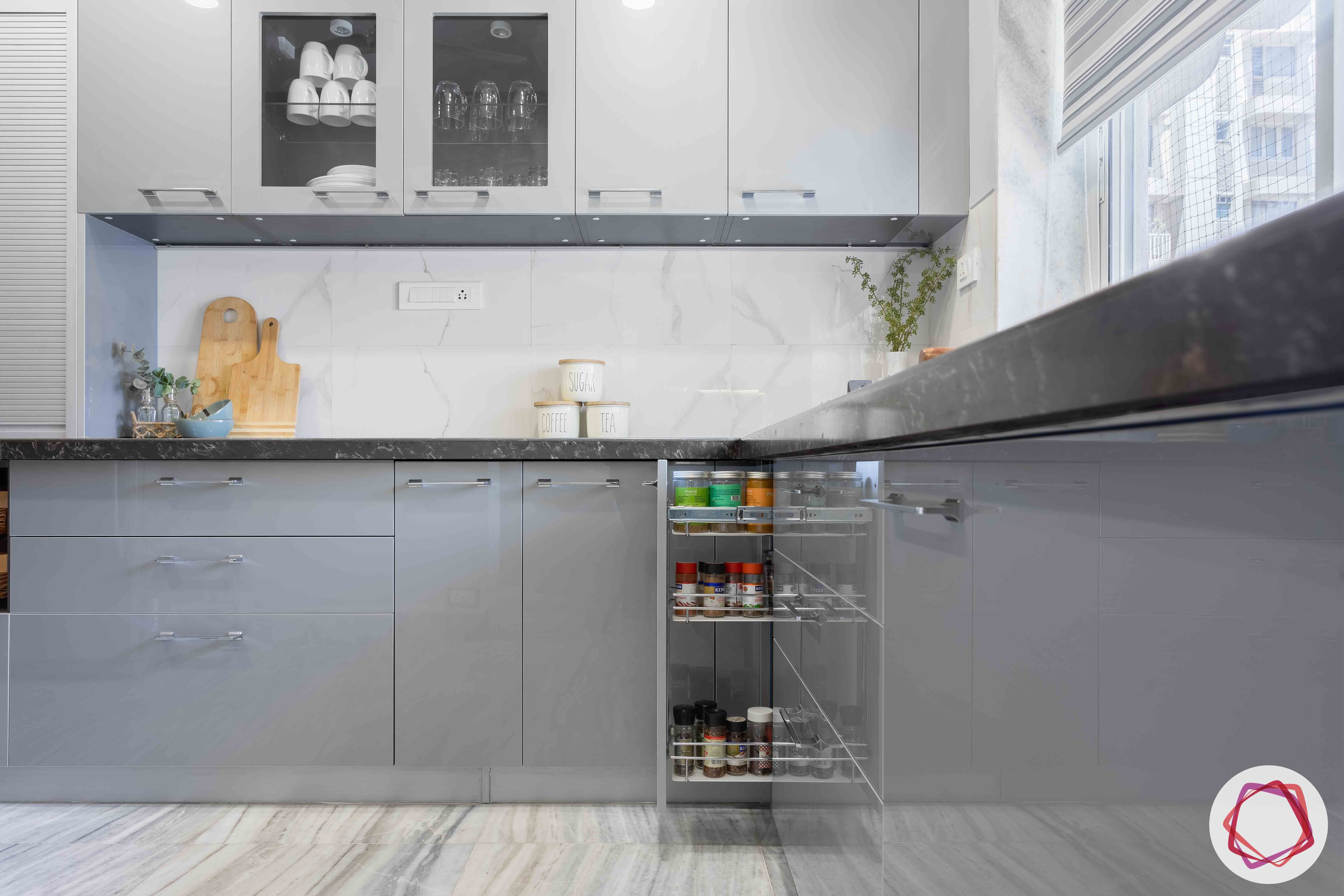 kitchen-base-grey-cabinets-pull-out-tray-glass-shutter-window